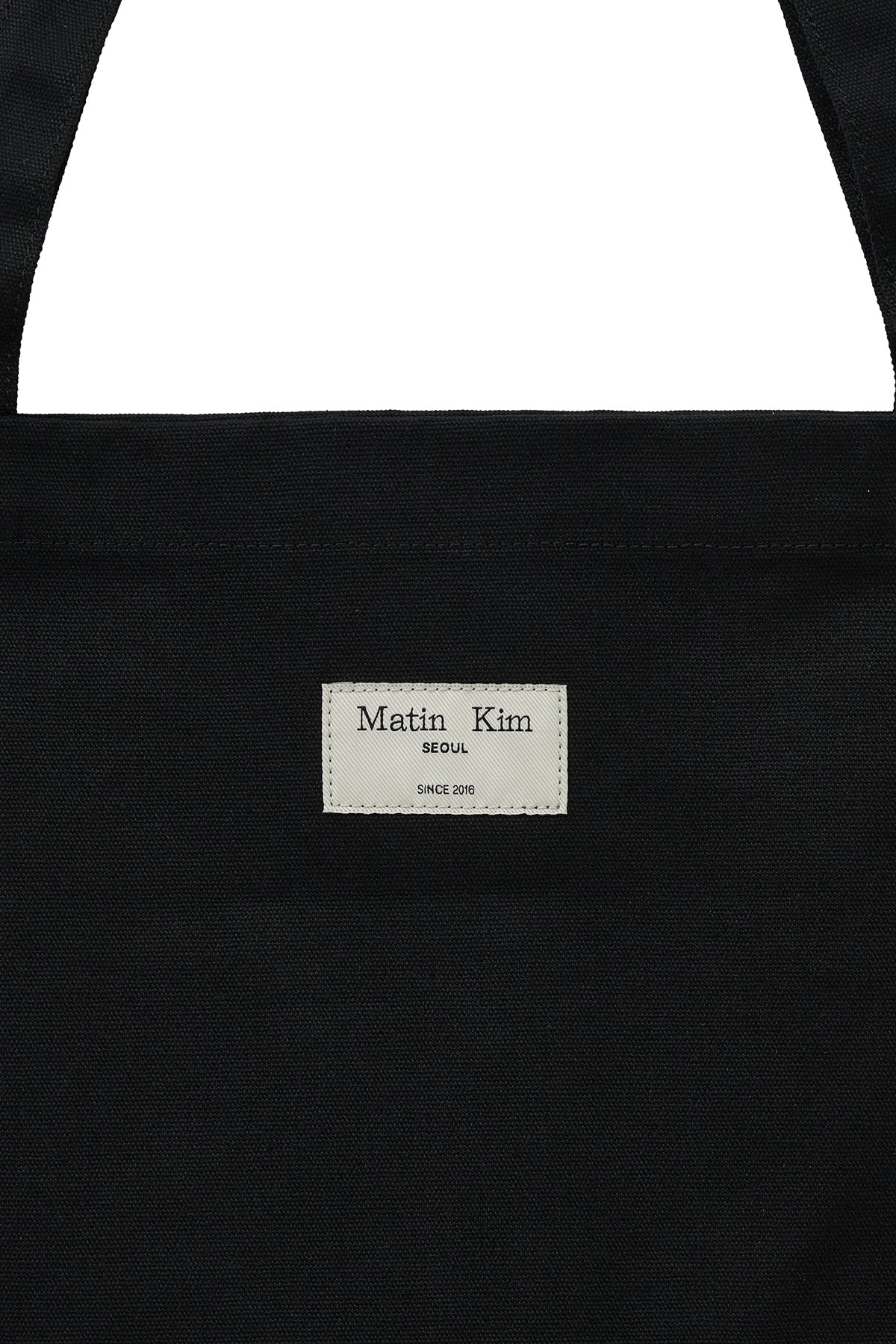matinkim MATIN LOGO STUD ECOBAG IN BLACK
