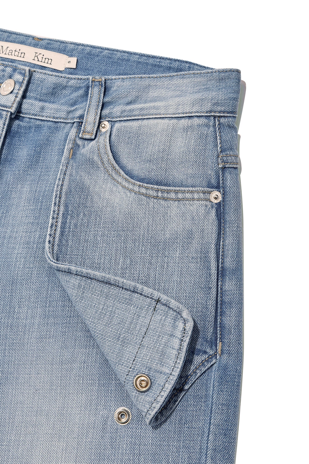 matinkim OUT POCKET WASHED DENIM PANTS IN LIGHT BLUE
