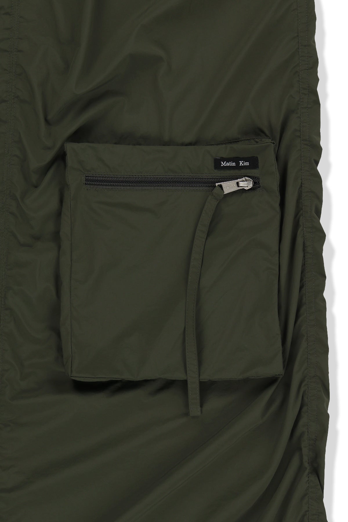 matinkim PATCH POCKET SHIRRING NYLON SKIRT IN KHAKI