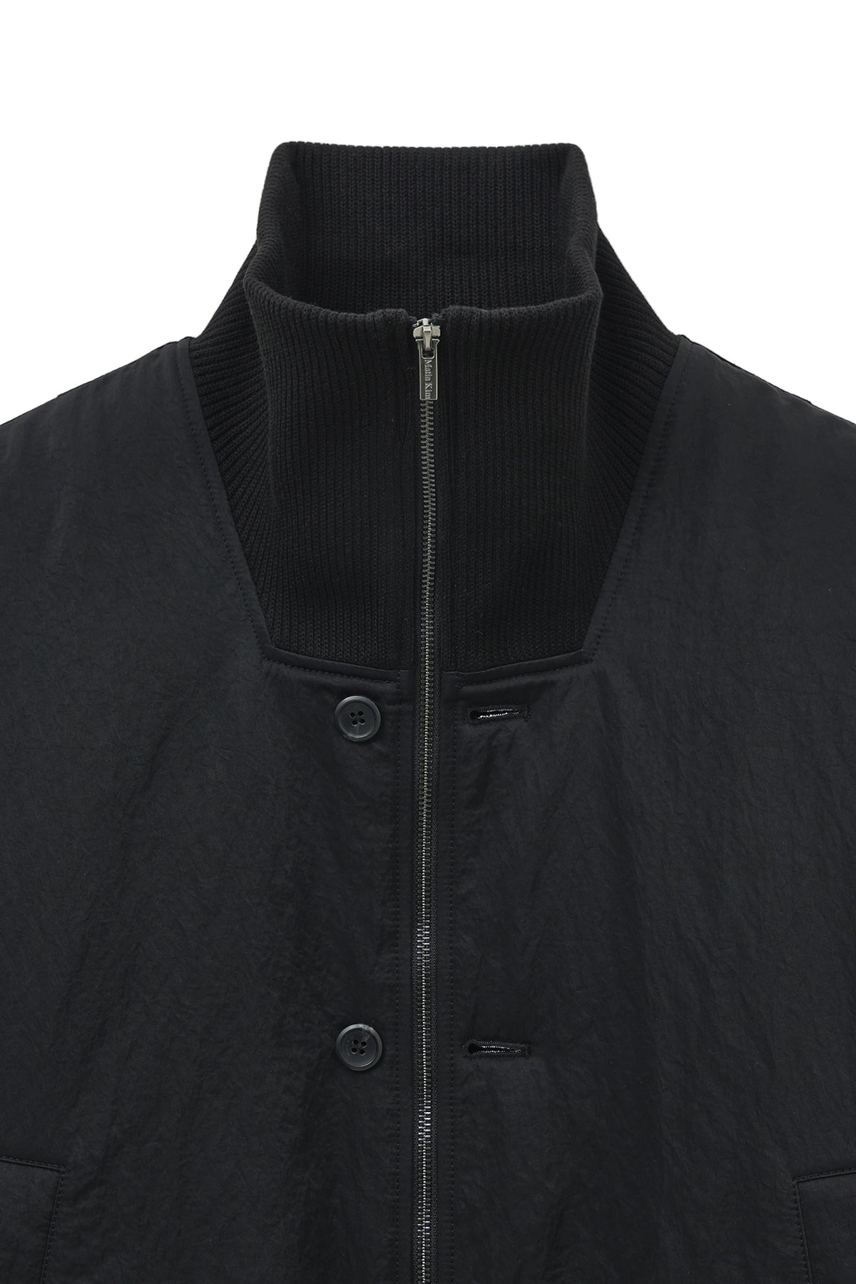 matinkim HIGH NECK BUTTON POINT ZIP UP JUMPER IN BLACK