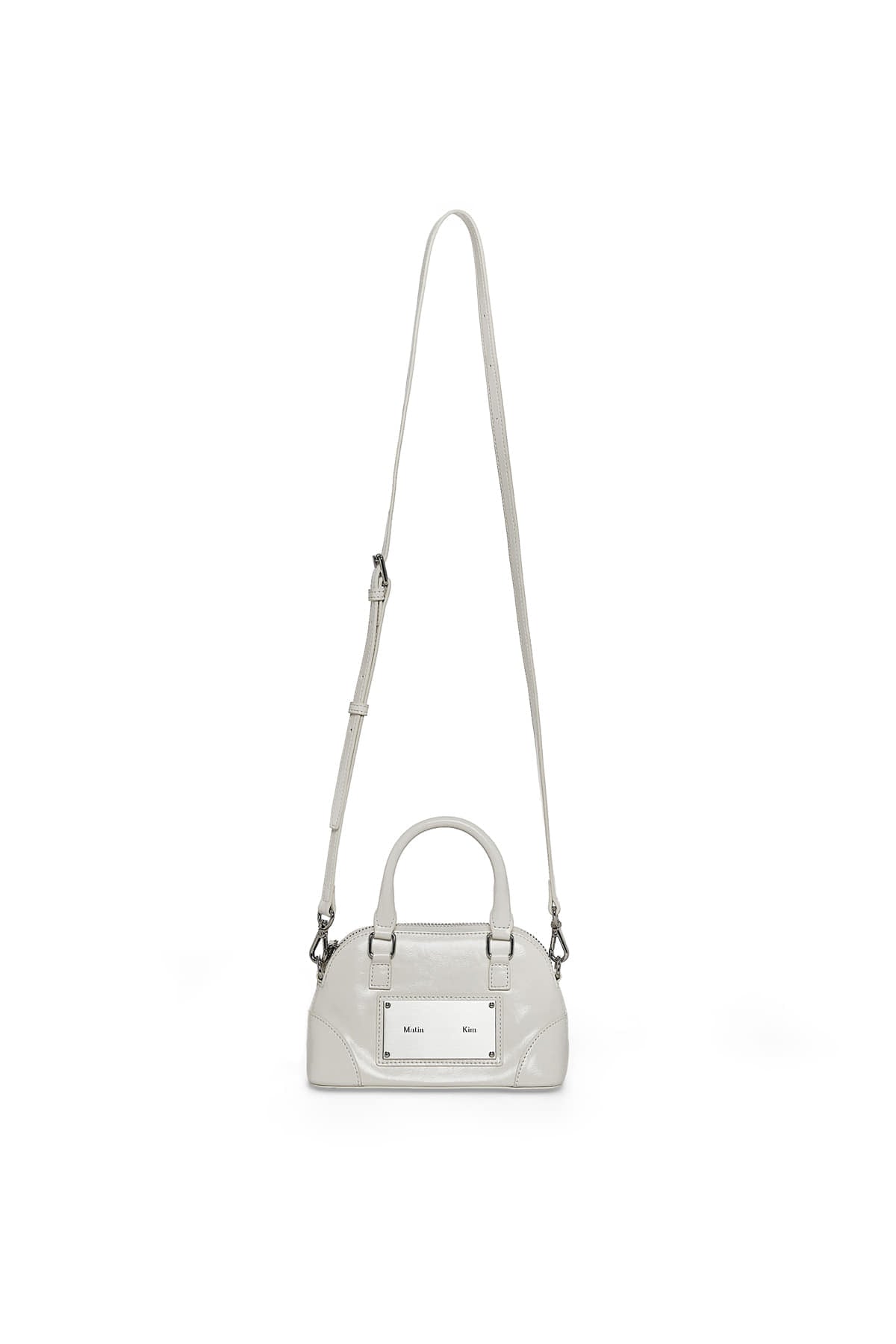 matinkim CURVE ZIP MINI BAG IN LIGHT GREY