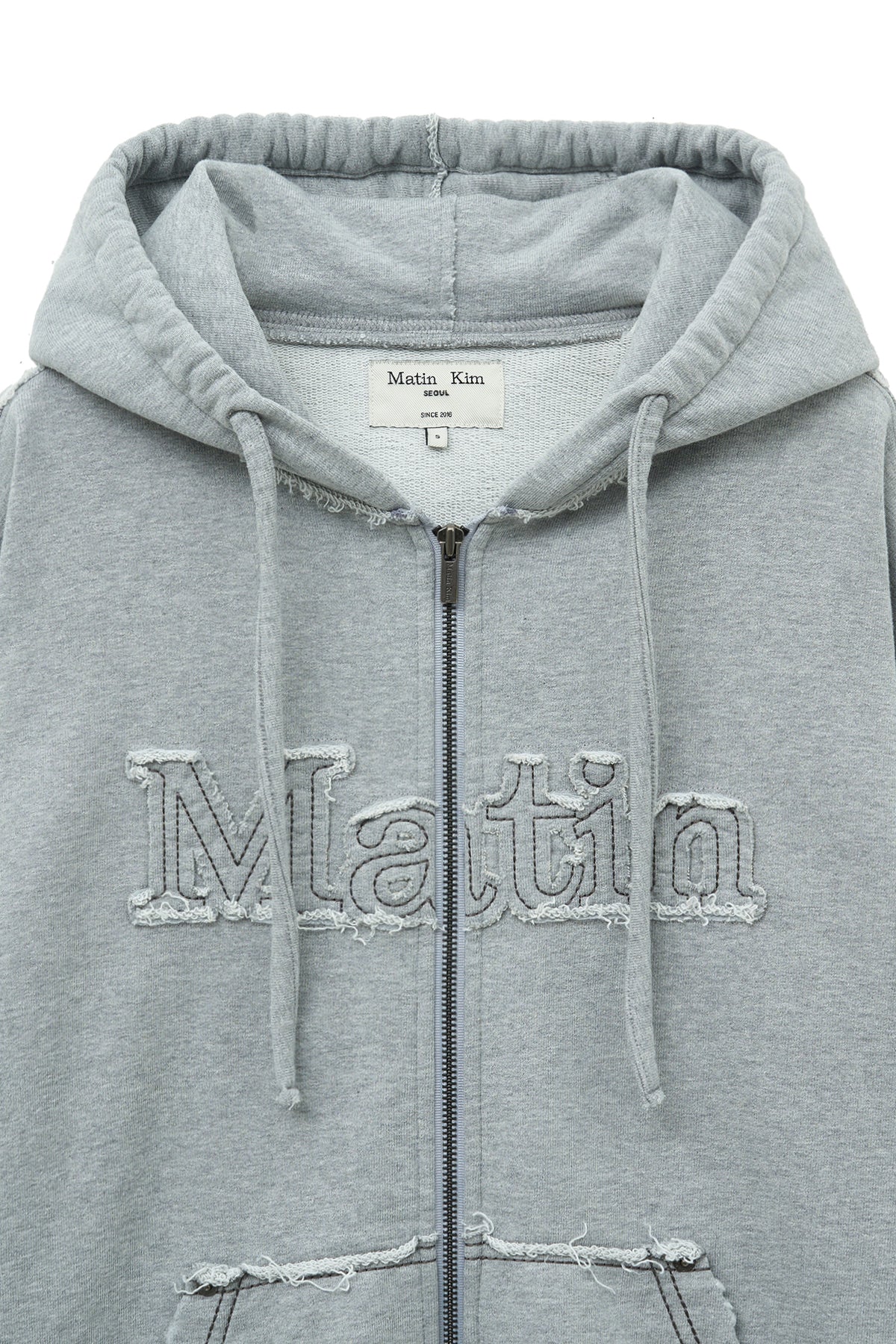 matinkim RAW CUT APPLIQUE HOODY ZIP UP IN GREY