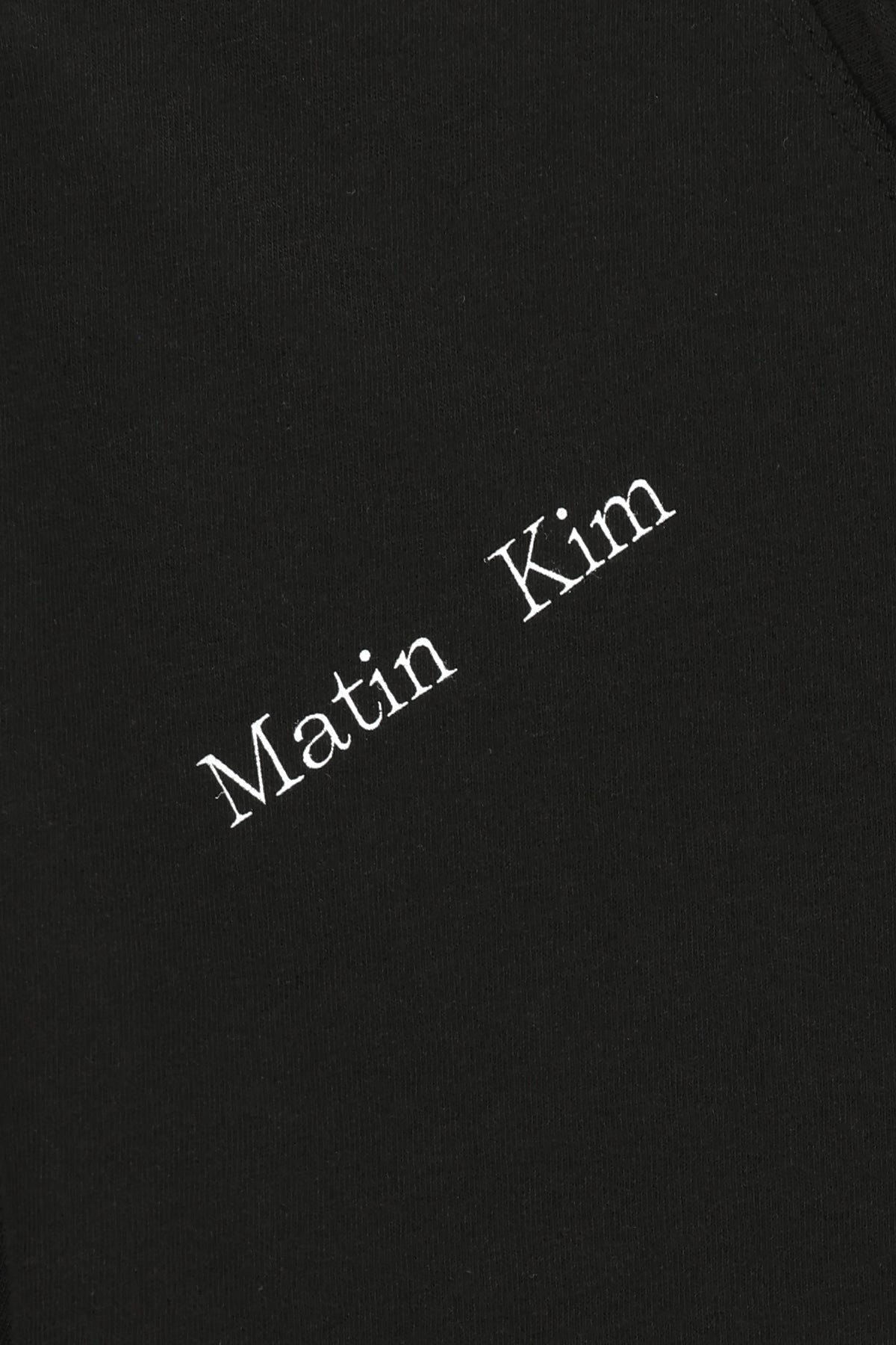 matinkim ASYMMETRIC OFF SHOULDER TOP IN BLACK