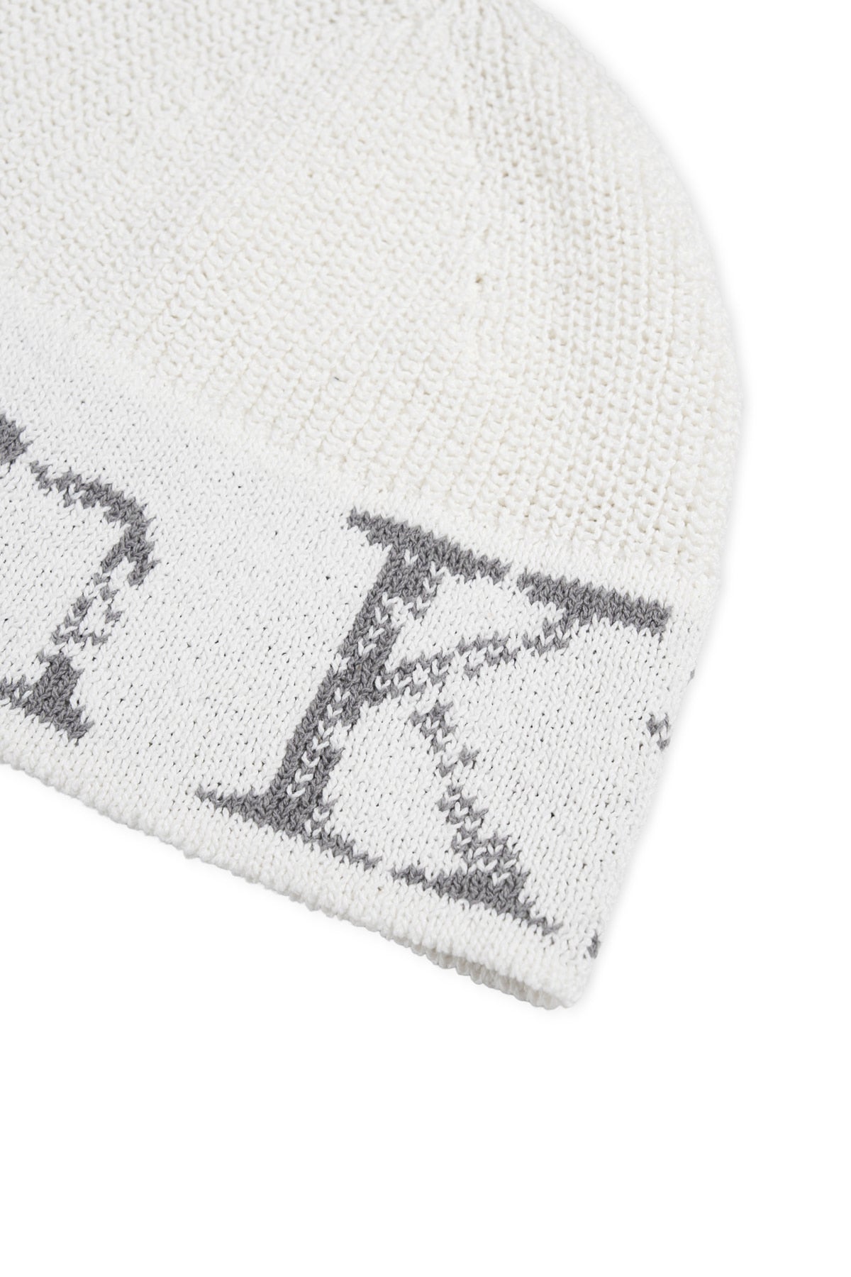 matinkim CRACKED LOGO LIGHT BUCKET BEANIE IN IVORY