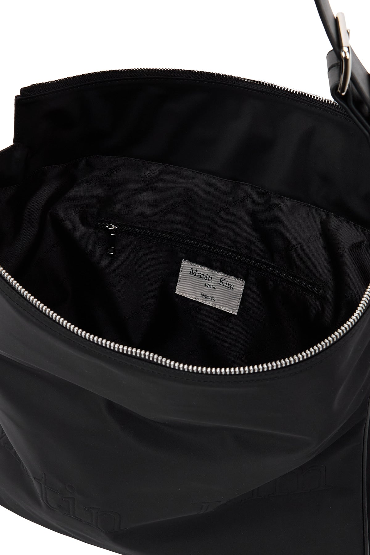 matinkim EMBOSSED LOGO FABRIC SHOULDER BAG IN BLACK