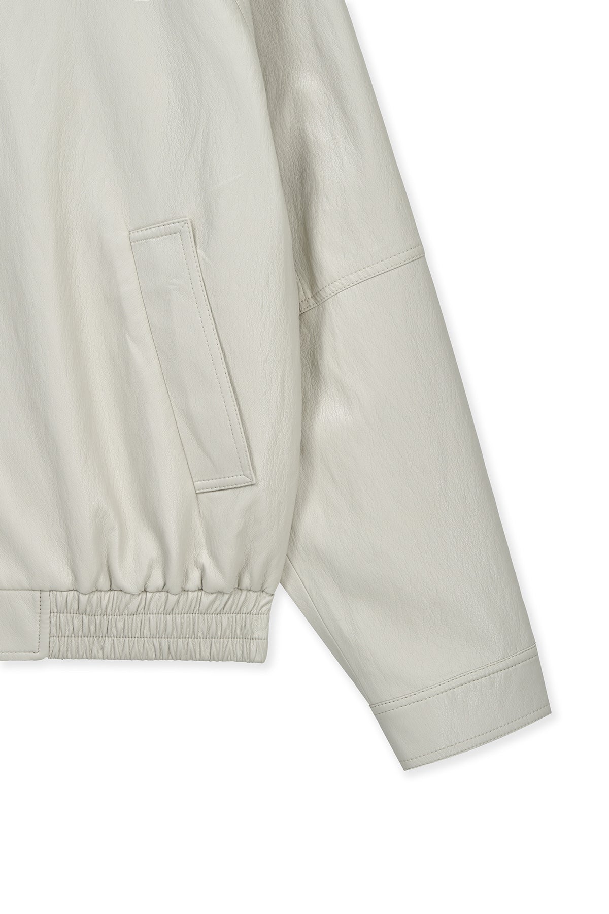 matinkim SMALL LOGO FAUX LEATHER ZIP UP JUMPER IN LIGHT GREY