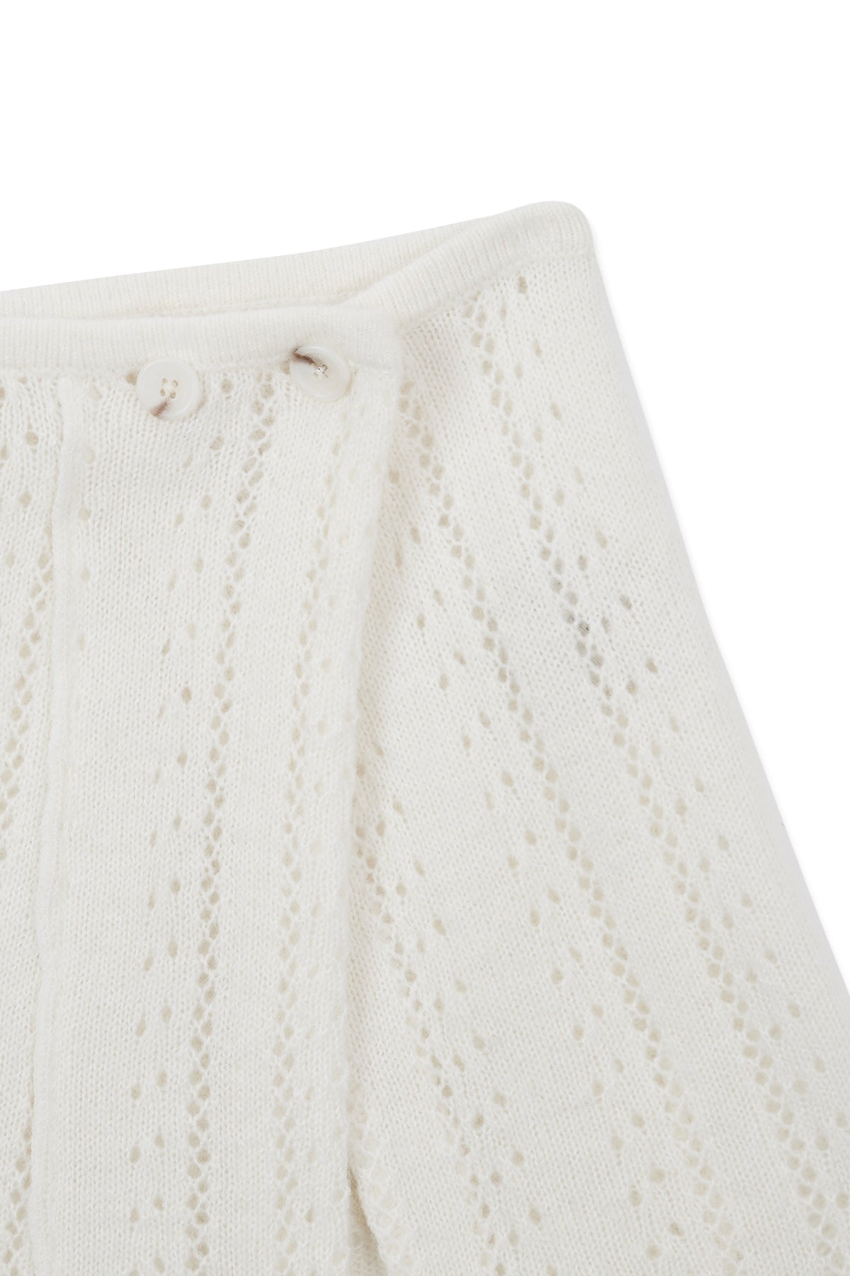 matinkim PUNCHING WRAP MINI SKIRT IN IVORY