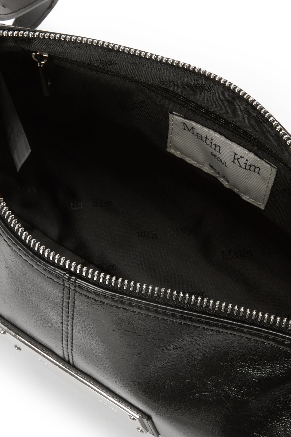 matinkim BUCKLE STRAP SHOULDER BAG IN BLACK