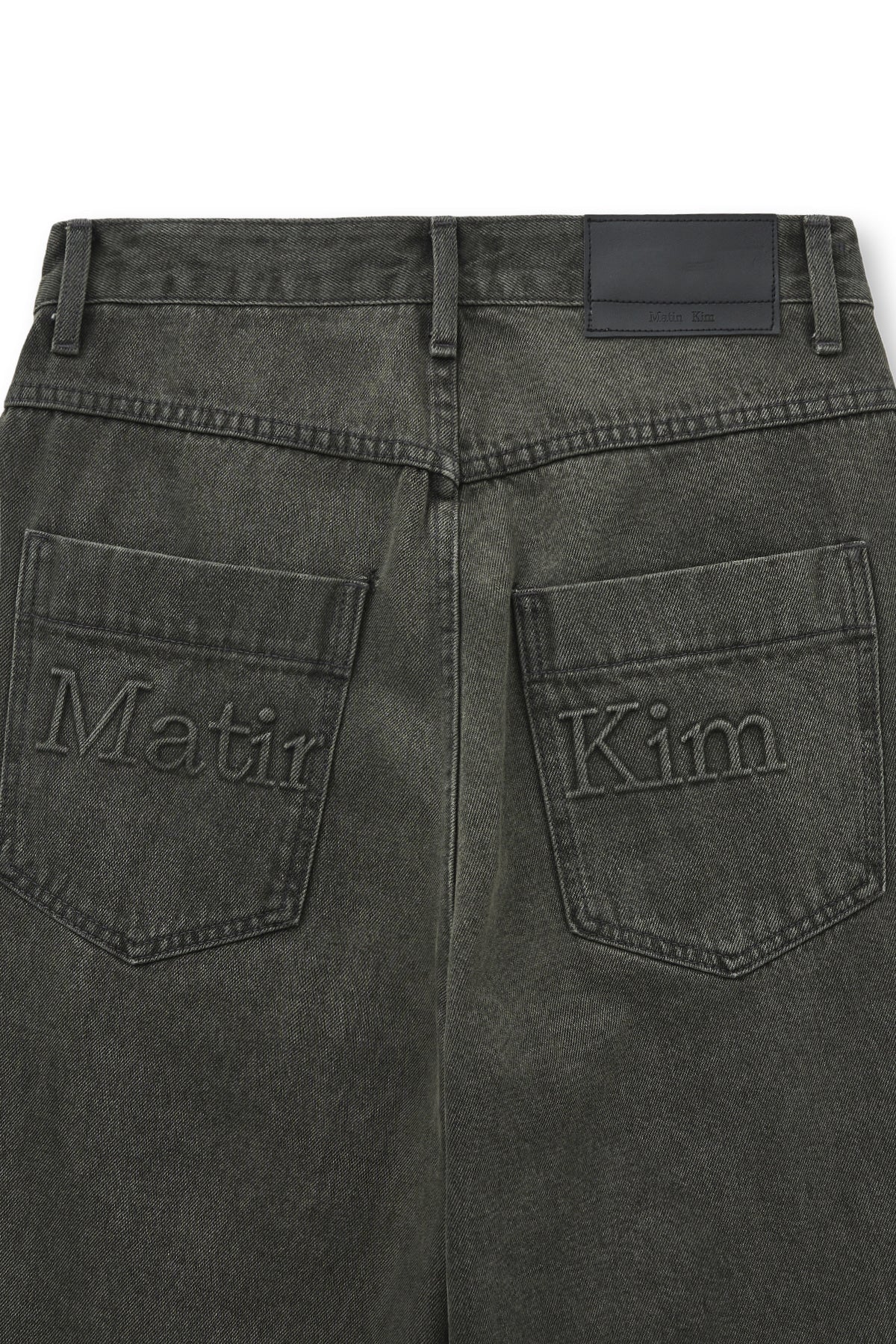matinkim BACK LOGO WIDE DENIM PANTS IN CHARCOAL