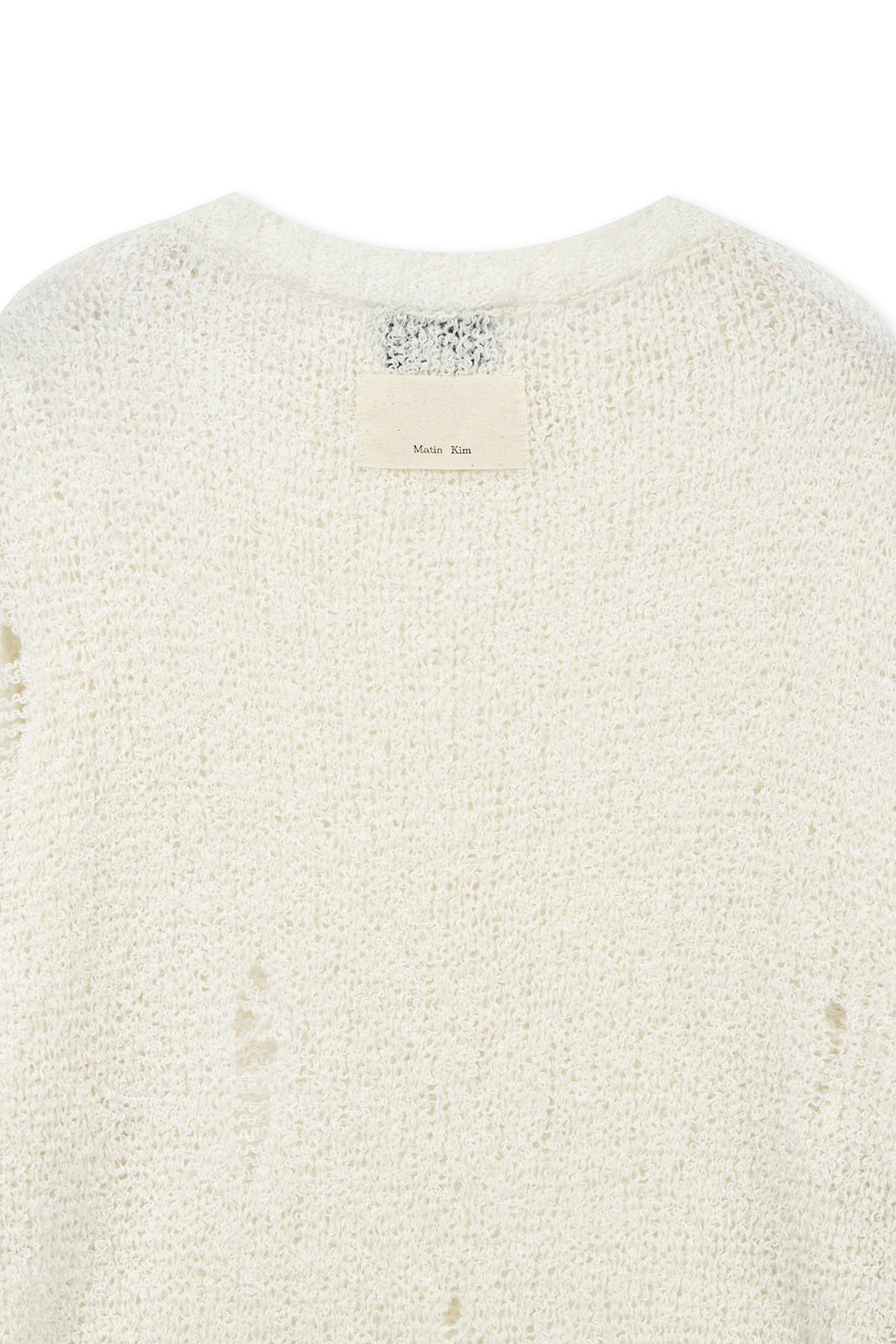 matinkim ASYMMETRIC DAMAGED KNIT PULLOVER IN IVORY