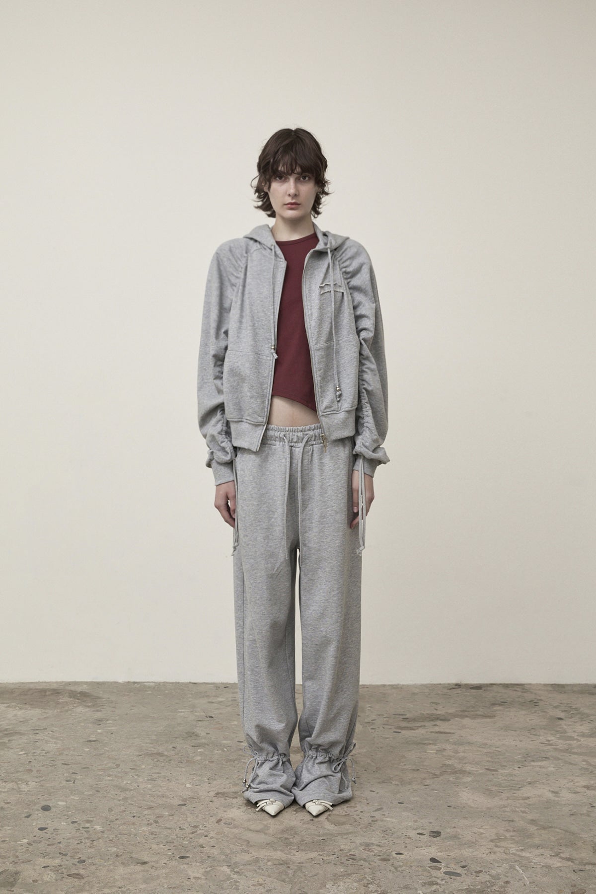 matinkim SLEEVE STRING DETAIL HOODY ZIP UP IN GREY