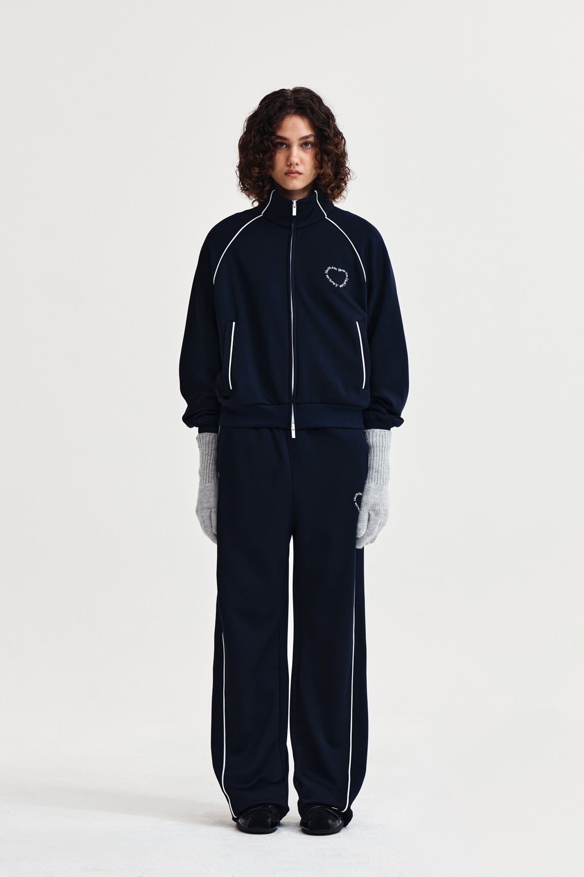 matinkim HEART LOGO TRACK PANTS IN NAVY