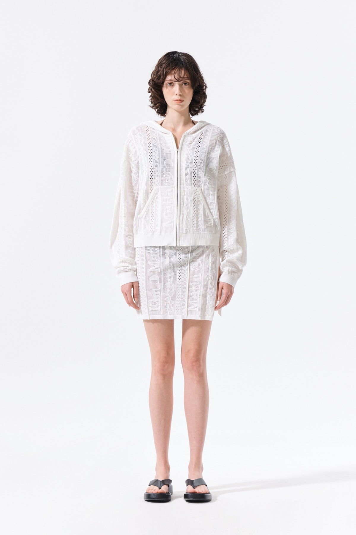 matinkim MESH LOGO WRAP MINI SKIRT IN WHITE