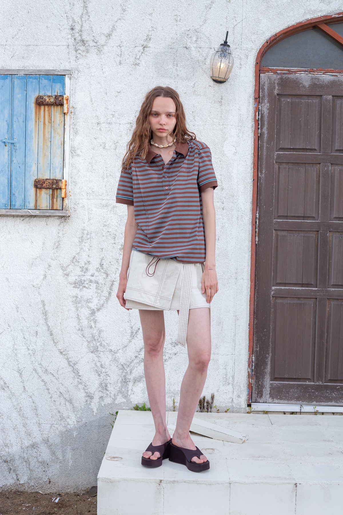 matinkim STITCH POINT BELTED WRAP SKIRT IN LIGHT BEIGE
