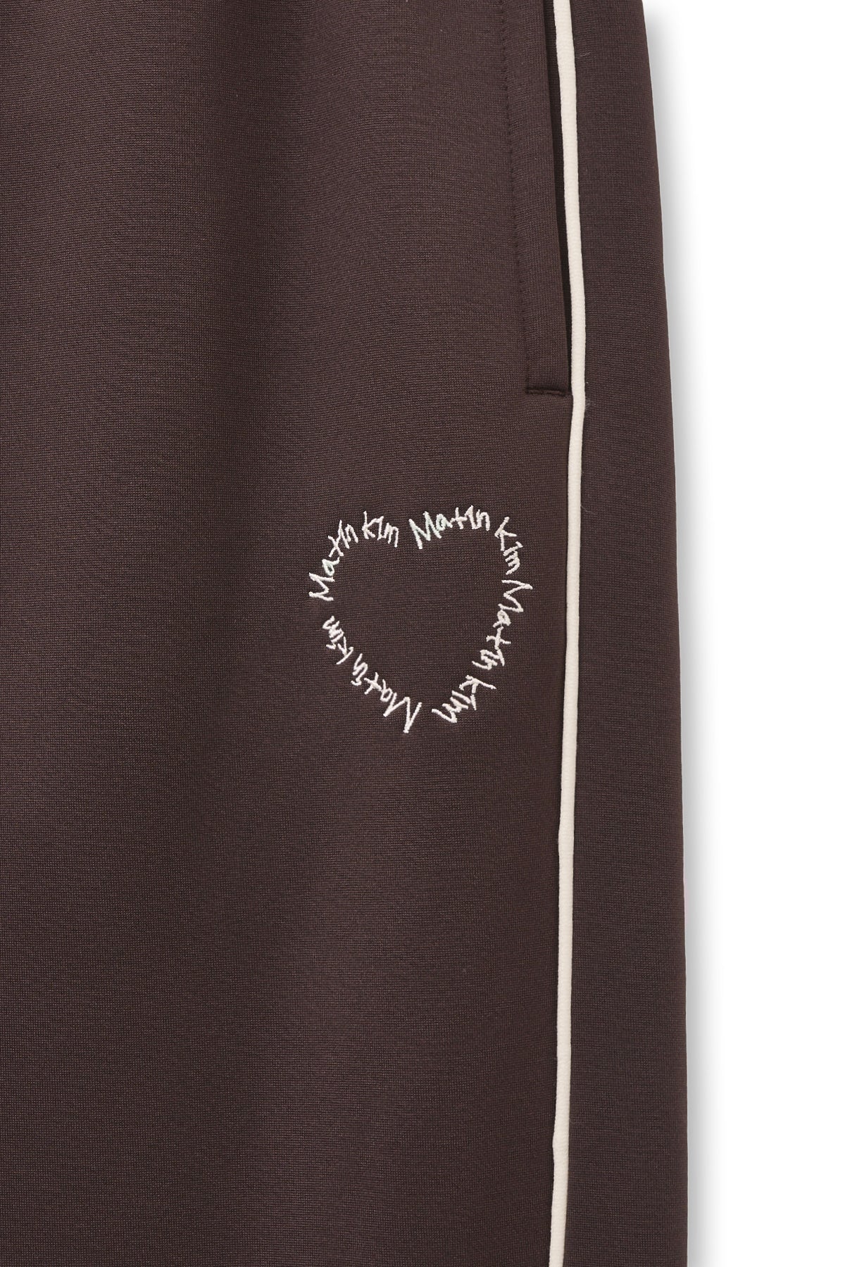 matinkim HEART LOGO TRACK PANTS IN BROWN