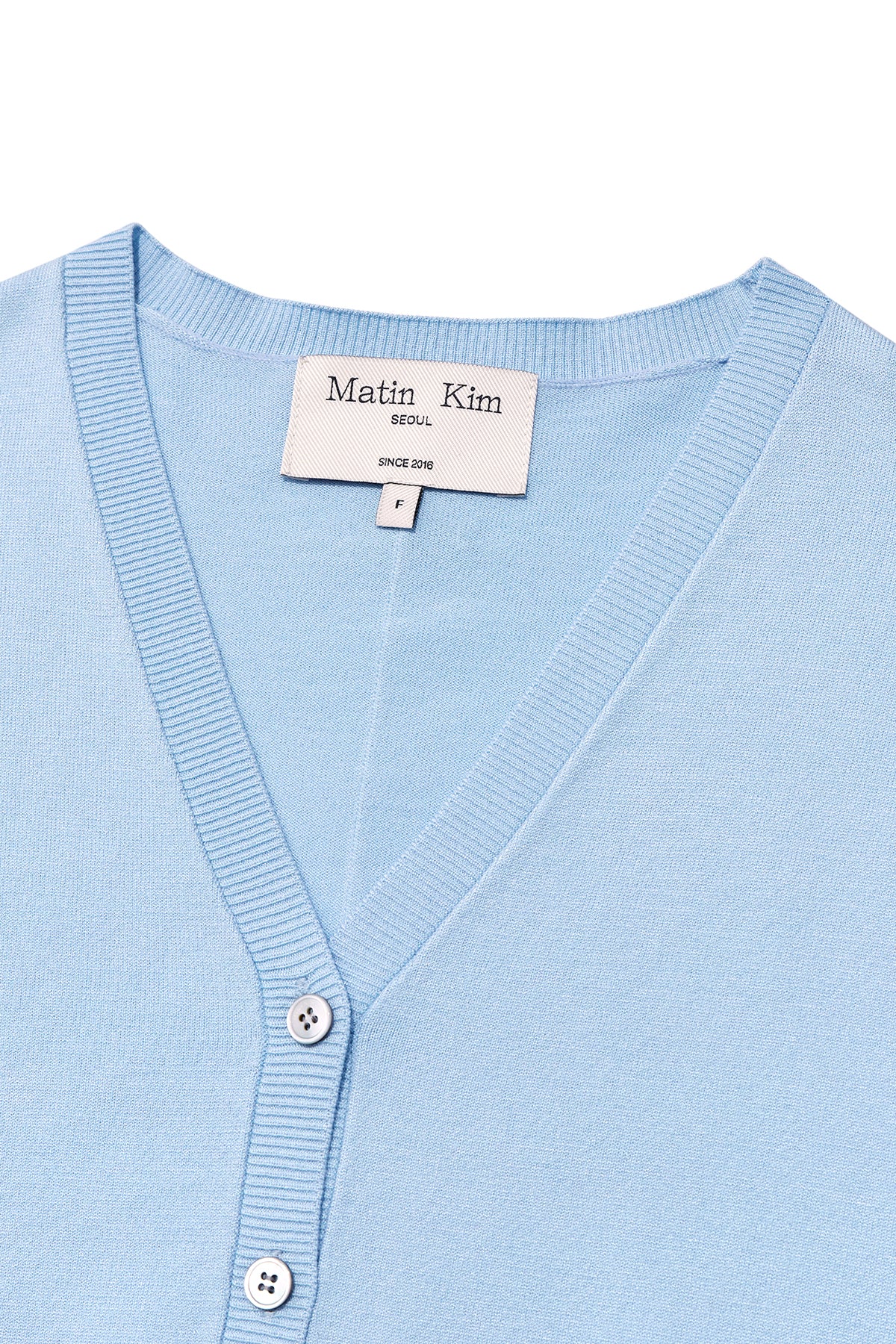 matinkim SLIT DETAIL BUTTON CARDIGAN IN LIGHT BLUE