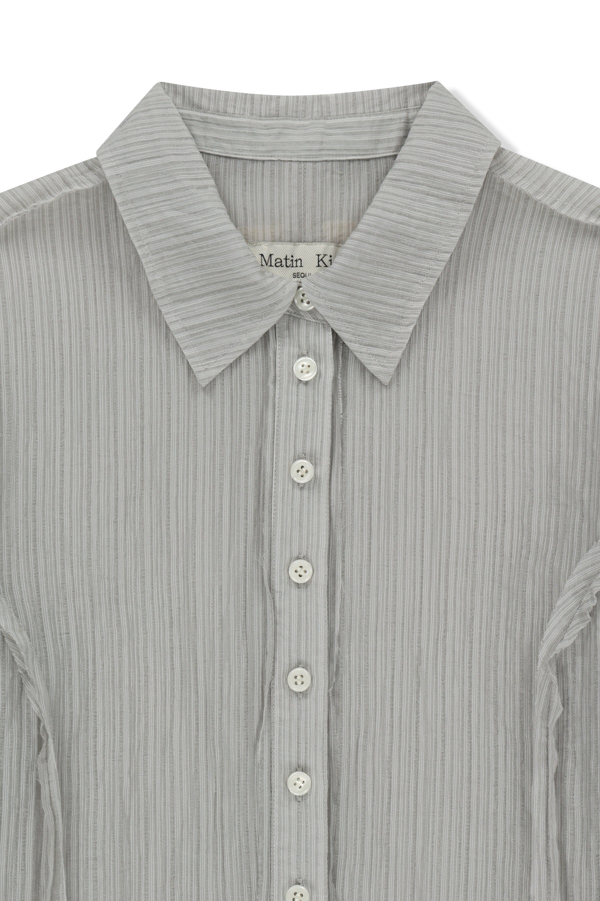 matinkim RAW EDGE CRINKLE BLOUSE IN LIGHT GREY