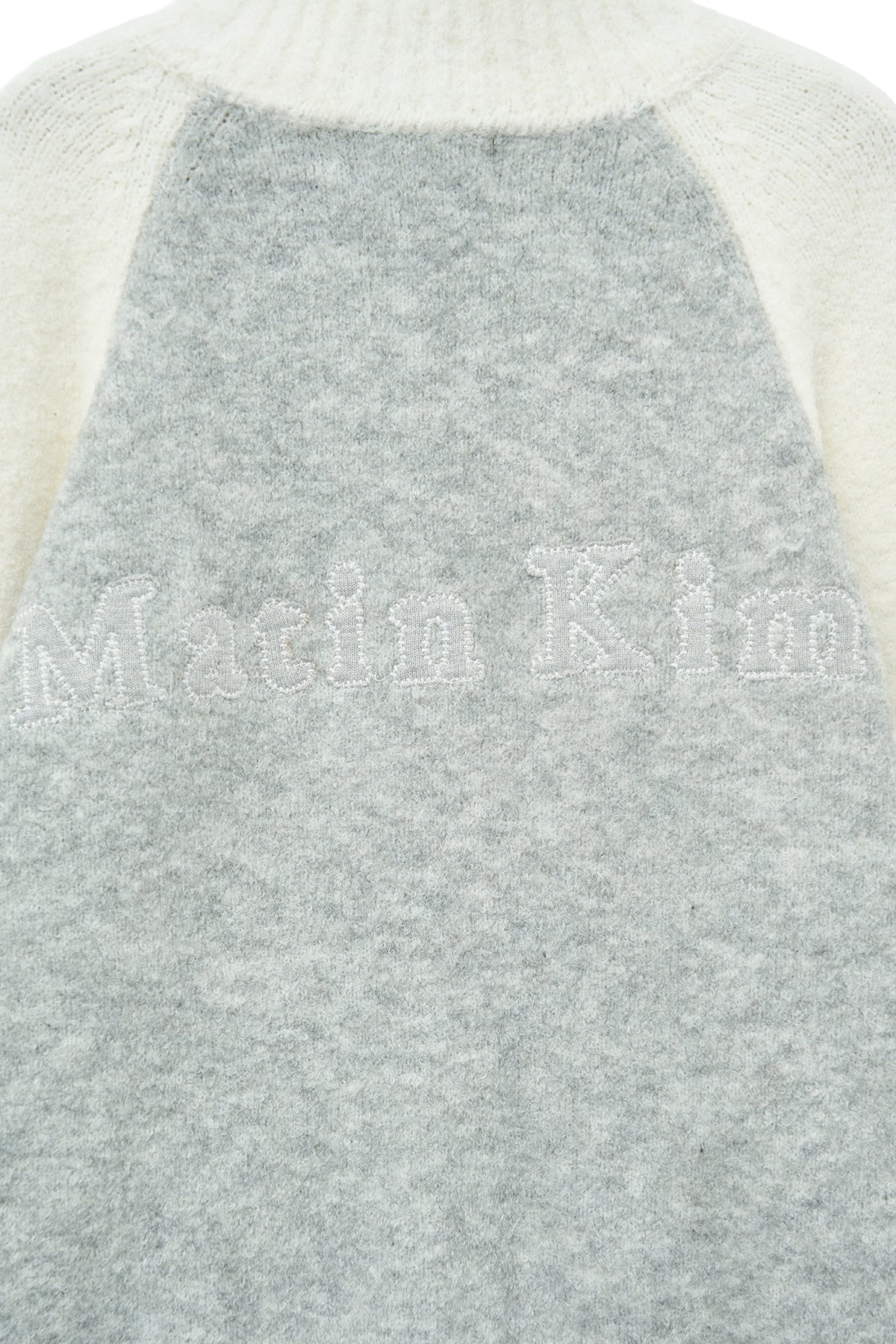 matinkim HIGH NECK RAGLAN KNIT ZIP UP FOR MEN IN IVORY