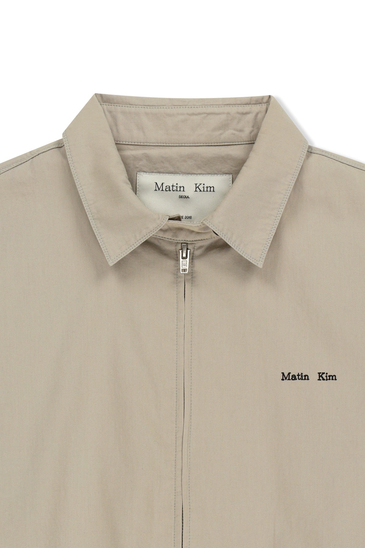 matinkim SMALL LOGO COTTON ZIP UP JUMPER IN LIGHT BEIGE