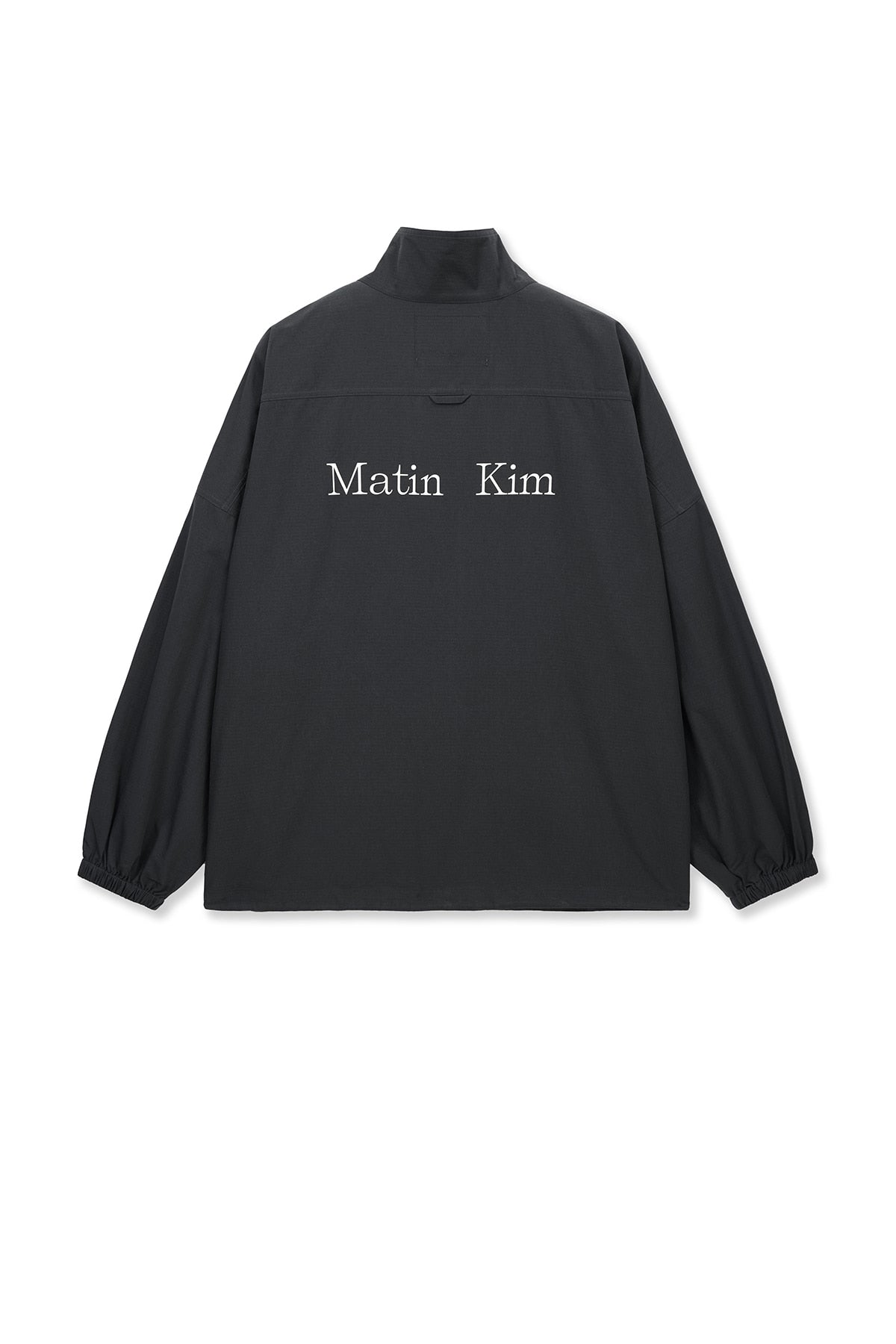 matinkim BACK LOGO HIGH NECK JUMPER IN CHARCOAL