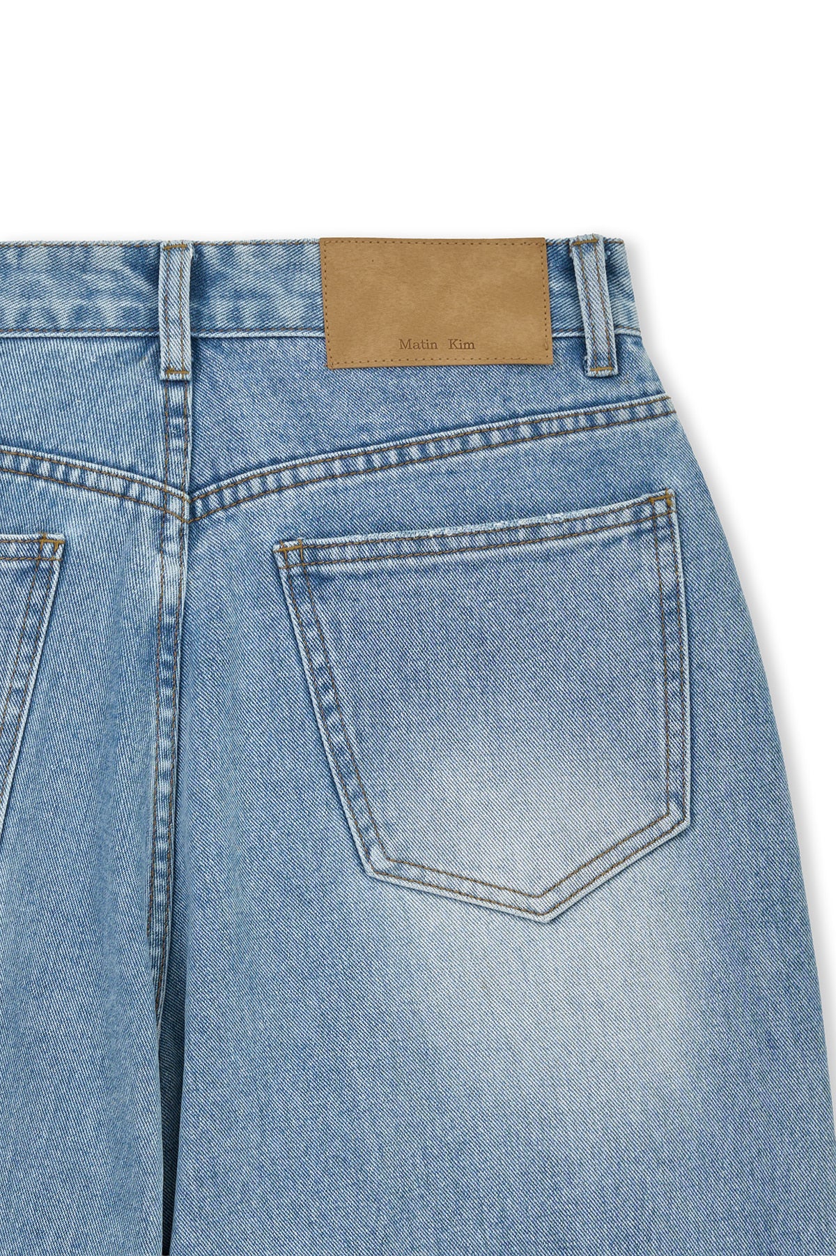 matinkim FRONT LAYERED DISTRESSED DENIM PANTS IN BLUE