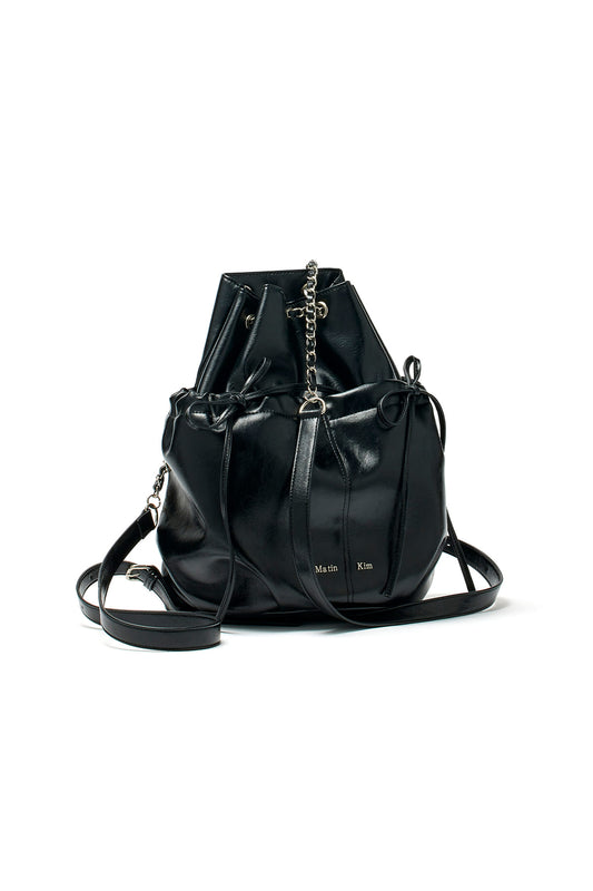 matinkim DRAW STRING RIBBON BACK PACK IN BLACK