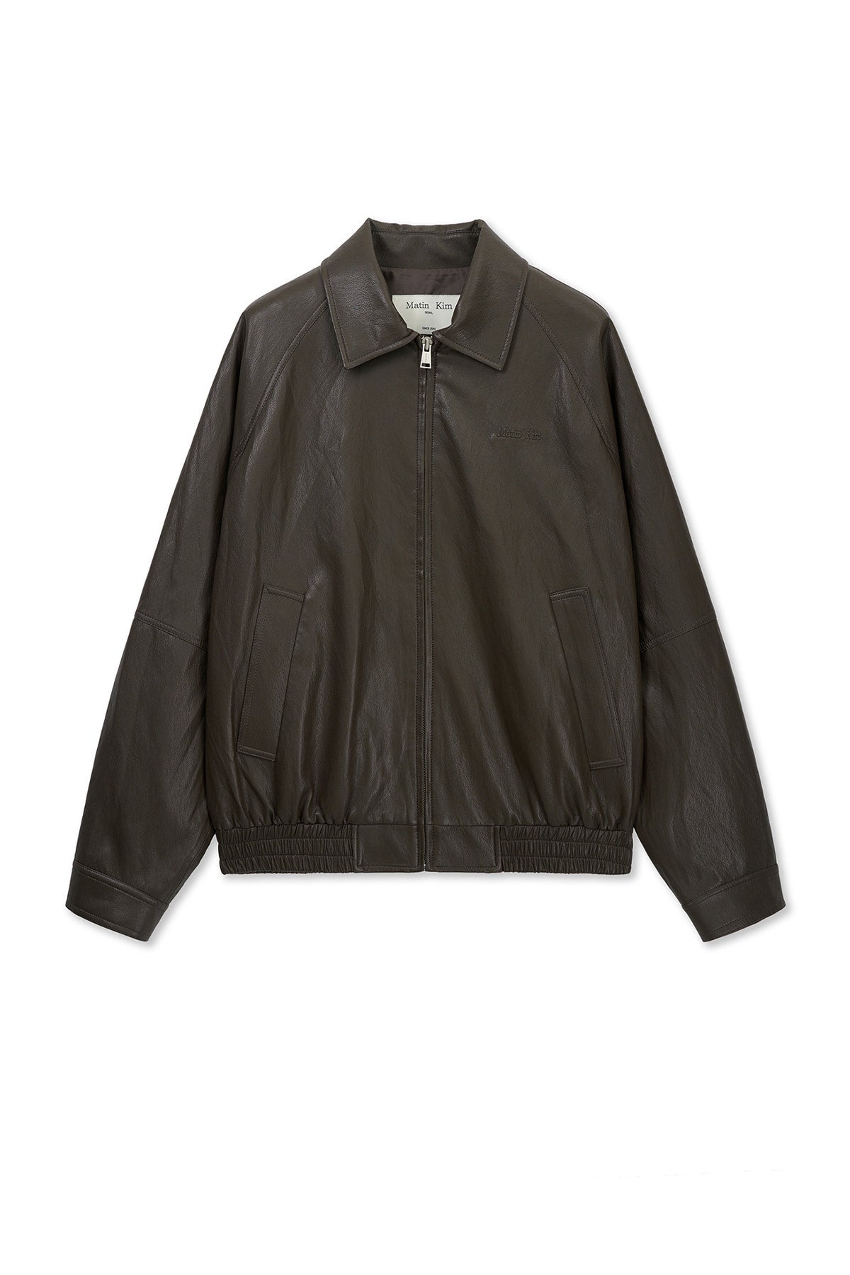 matinkim SMALL LOGO FAUX LEATHER ZIP UP JUMPER IN BROWN
