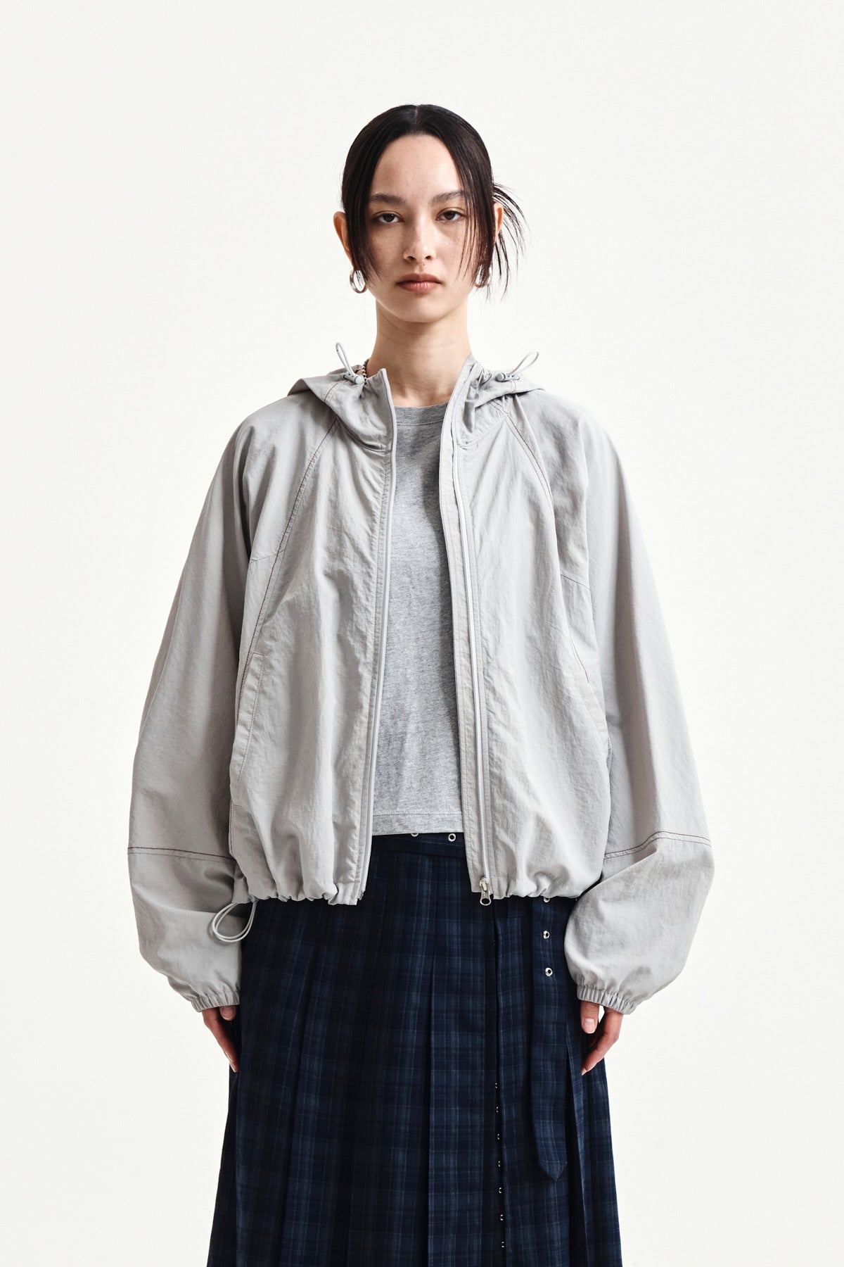 matinkim CROPPED BACK LOGO HOODY WIND BREAKER IN LIGHT BEIGE
