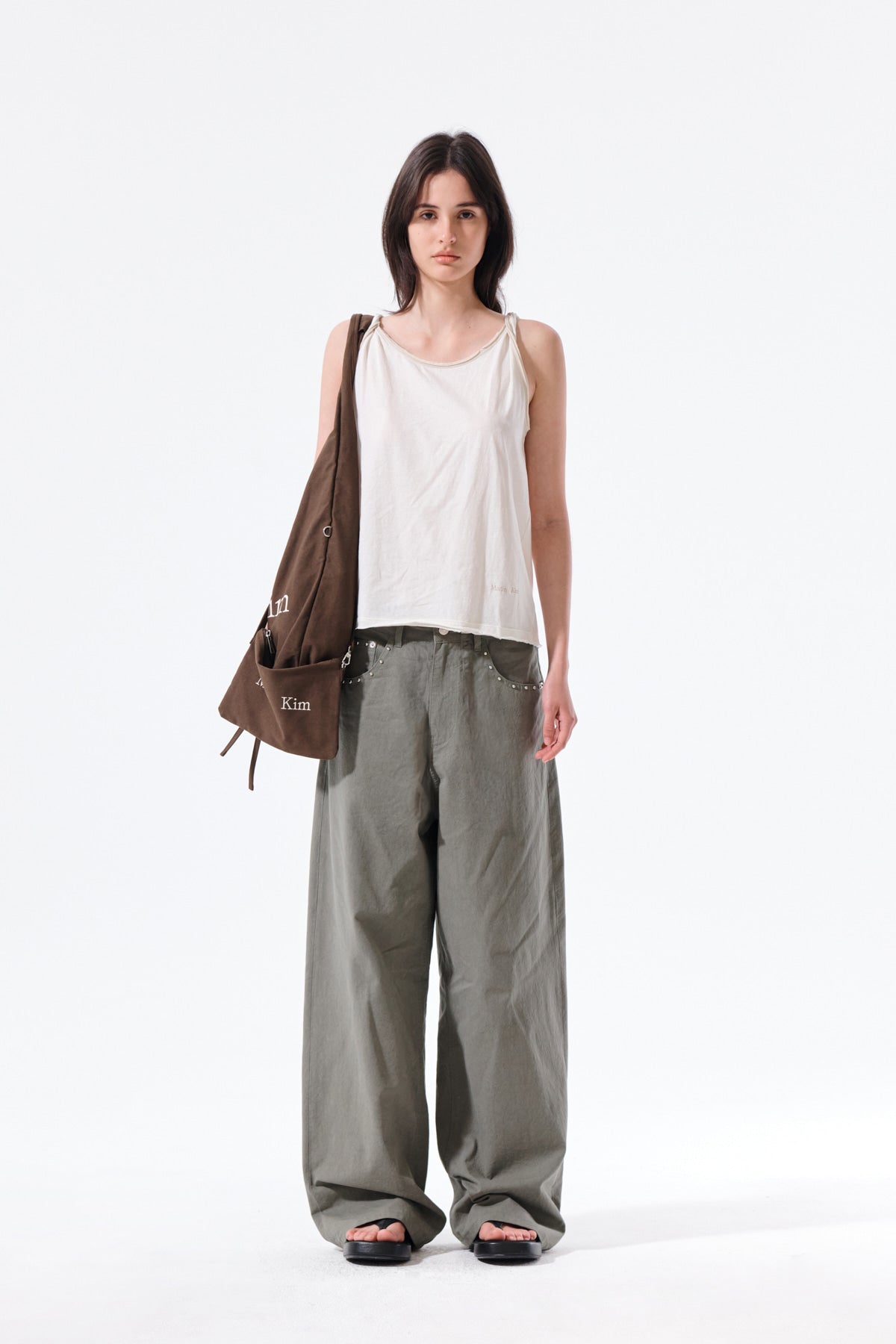 matinkim STUD POINT COLOR DENIM PANTS IN KHAKI