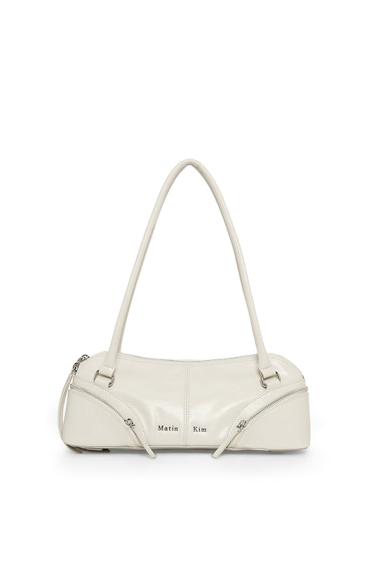 matinkim CURVE ZIP BAGUETTE BAG IN LIGHT GREY