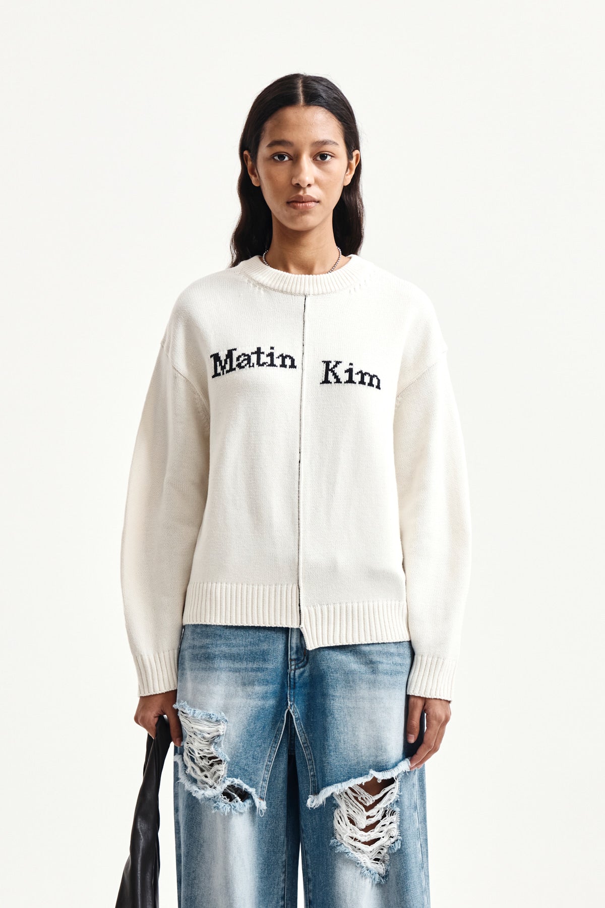 matinkim ASYMMETRIC LOGO KNIT PULLOVER IN IVORY