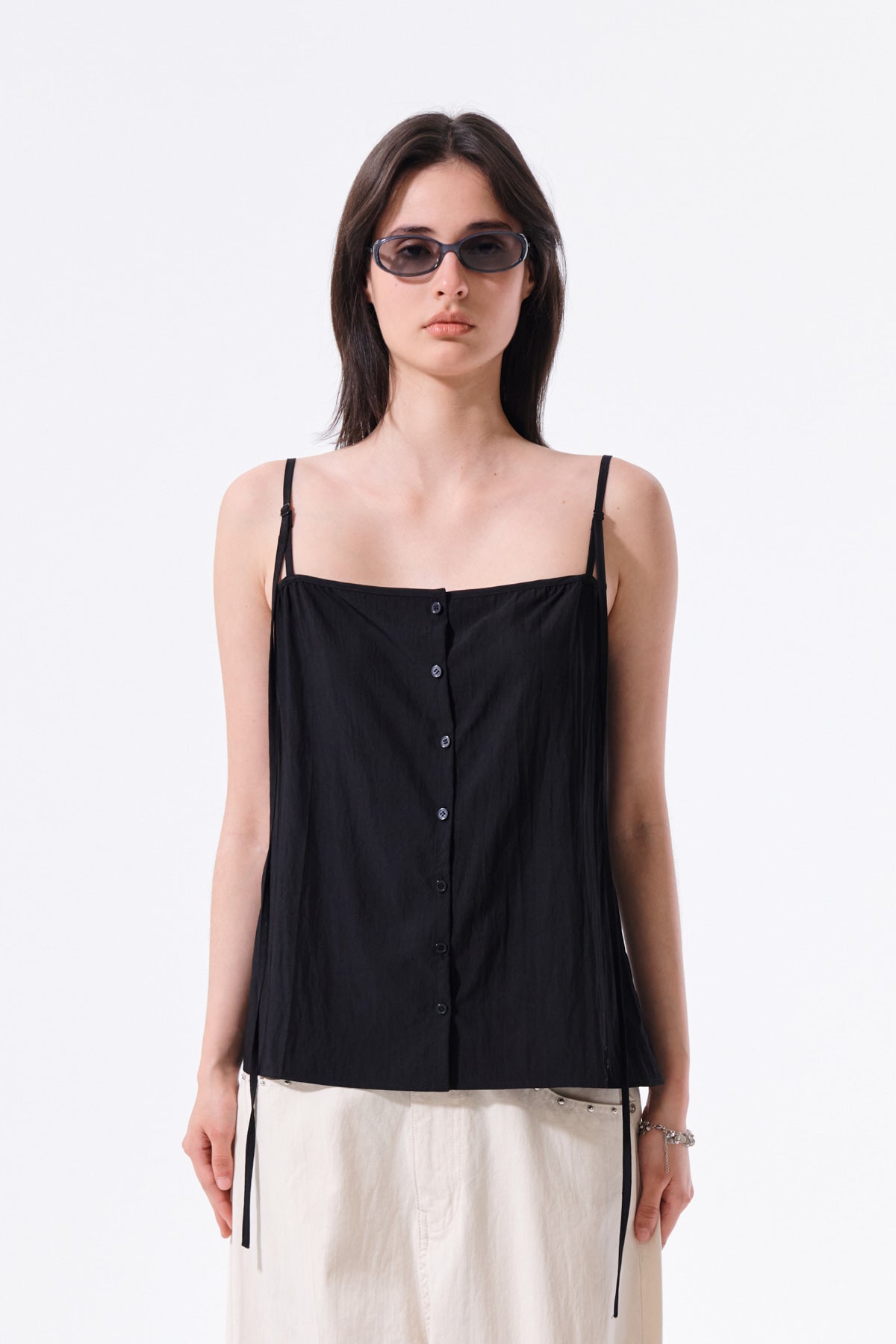 matinkim BUTTON SLEEVELESS BLOUSE IN BLACK