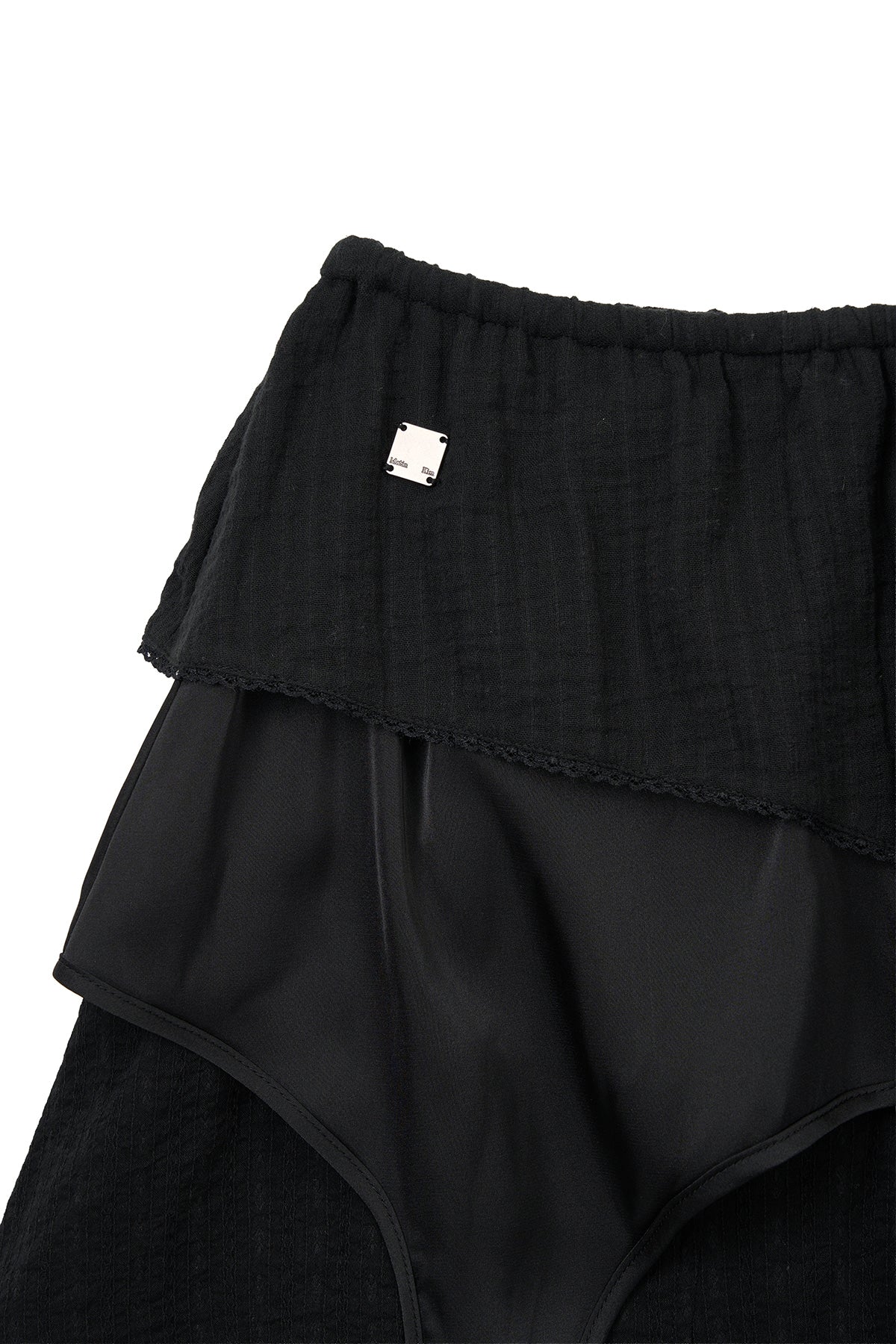 matinkim MULTI PANEL LAYERED SKIRT IN BLACK