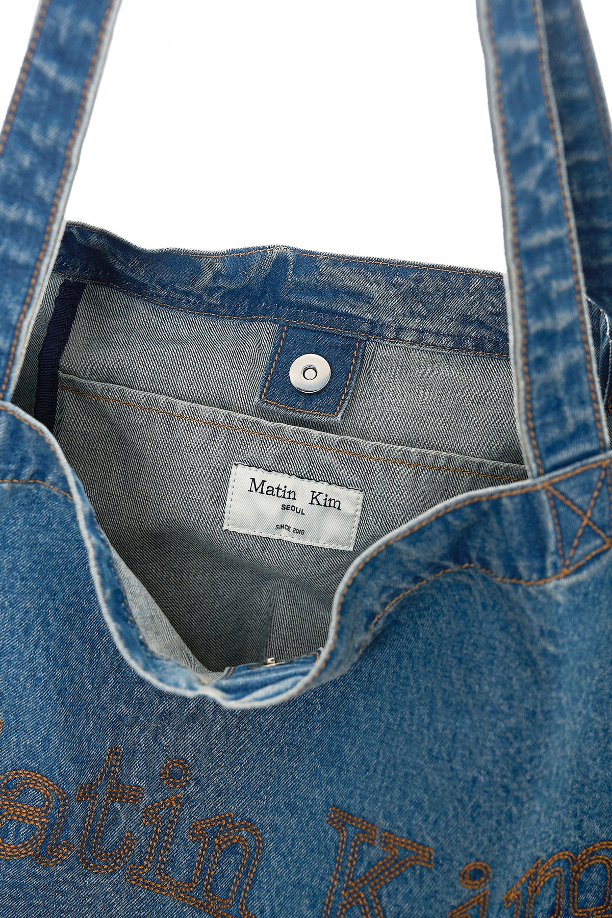 matinkim MATIN STITCH DENIM SHOULDER BAG IN BLUE