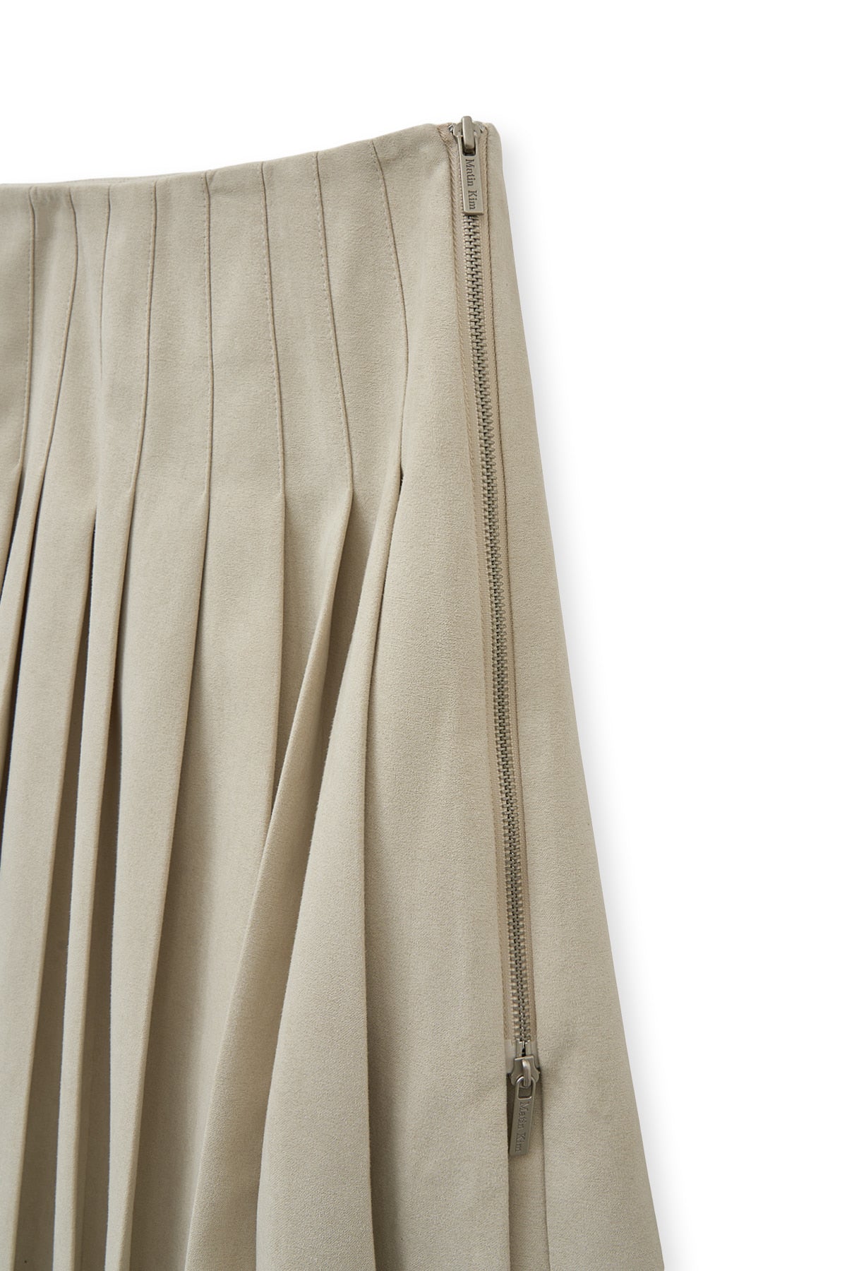 matinkim SIDE ZIPPER PLEATS MIDI SKIRT IN LIGHT BEIGE