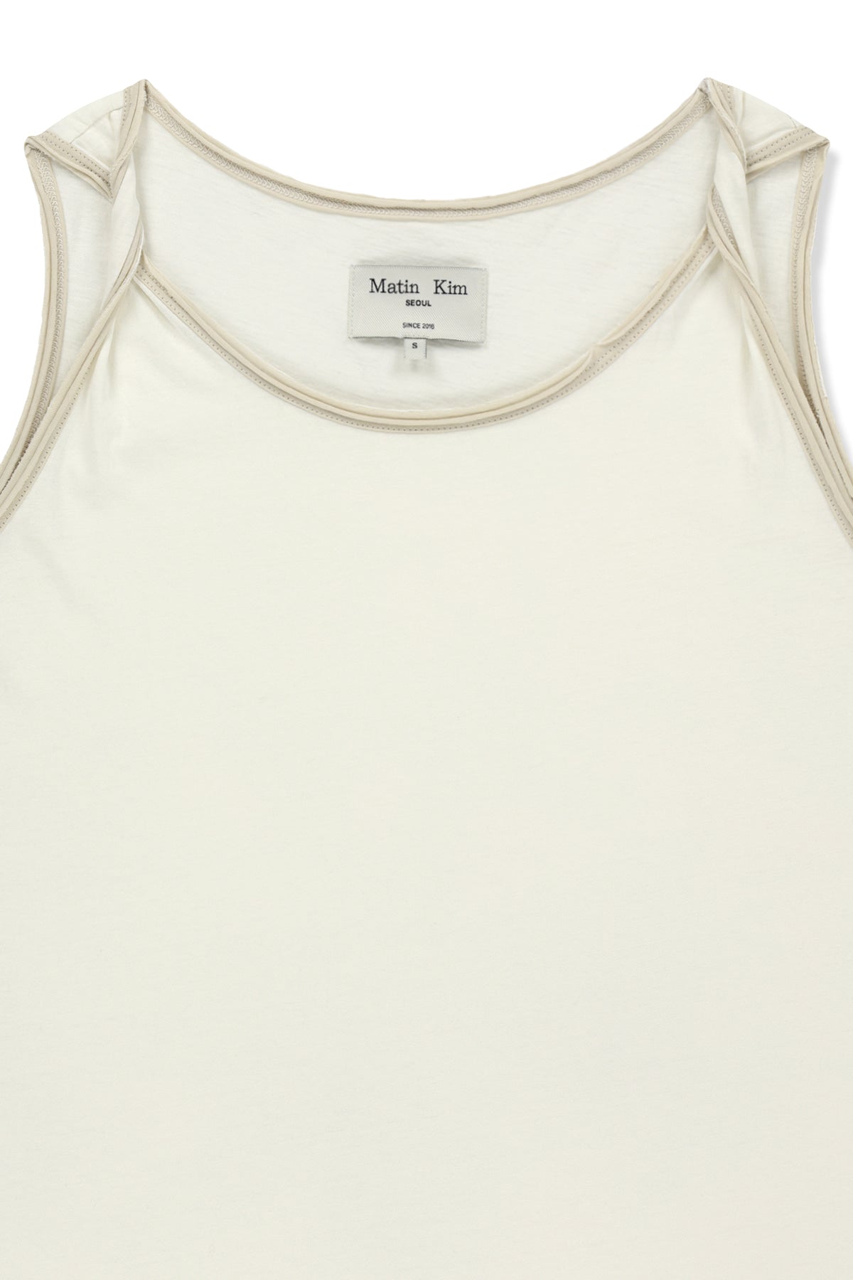 matinkim TWIST SHOULDER SLEEVELESS TOP IN CREAM
