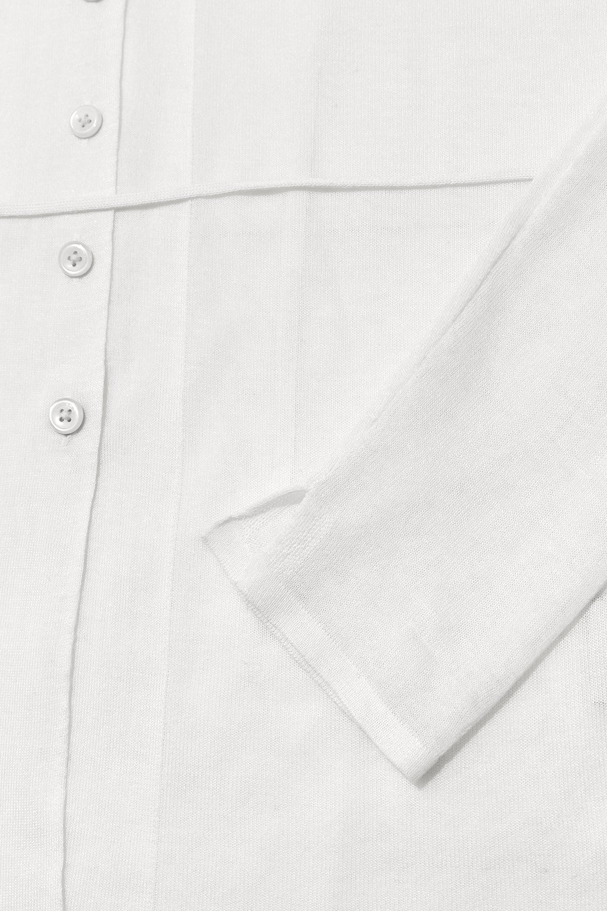 matinkim STRING POINT PLAIN LONG CARDIGAN IN WHITE