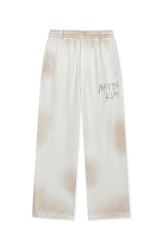 matinkim VINTAGE WASHED LOGO SWEATPANTS IN IVORY