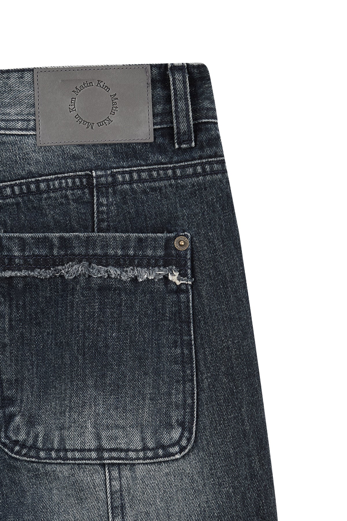 matinkim SEMI BOOTS CUT WASHED DENIM PANTS IN NAVY