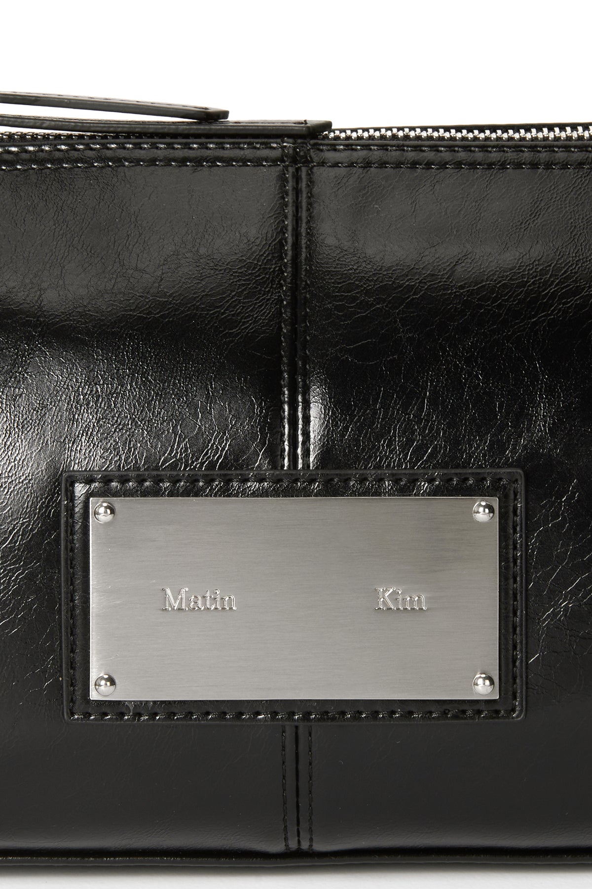matinkim BUCKLE STRAP SHOULDER BAG IN BLACK