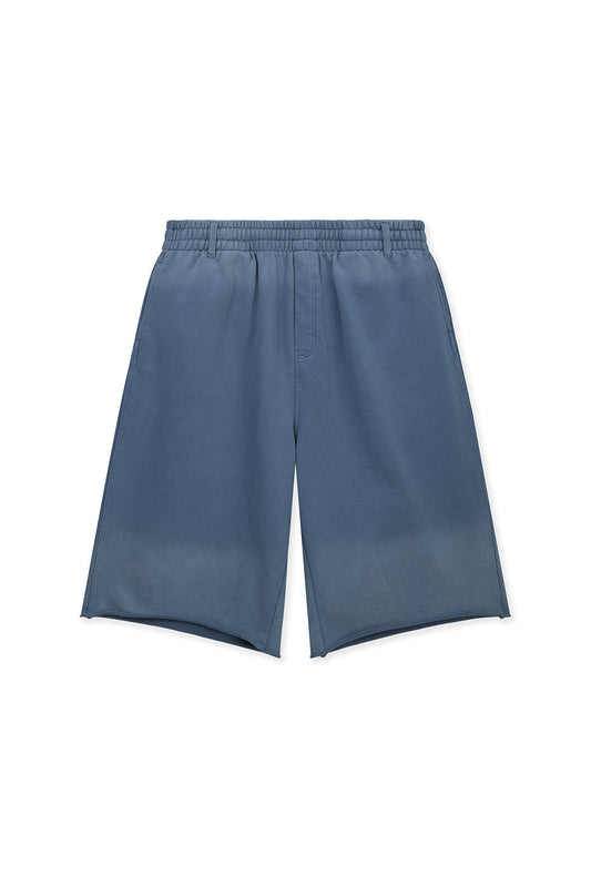 matinkim VINTAGE WASHED BACK LOGO BERMUDA SWEATPANTS IN SMOKE BLUE