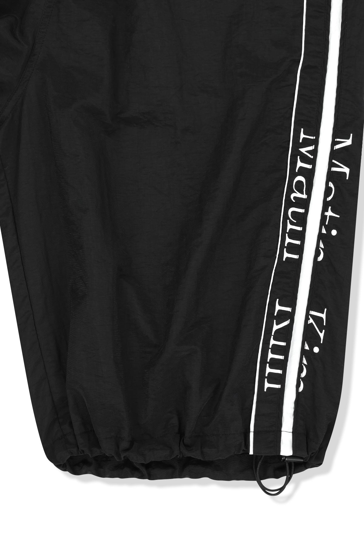 matinkim SIDE LOGO BERMUDA TRACK PANTS IN BLACK