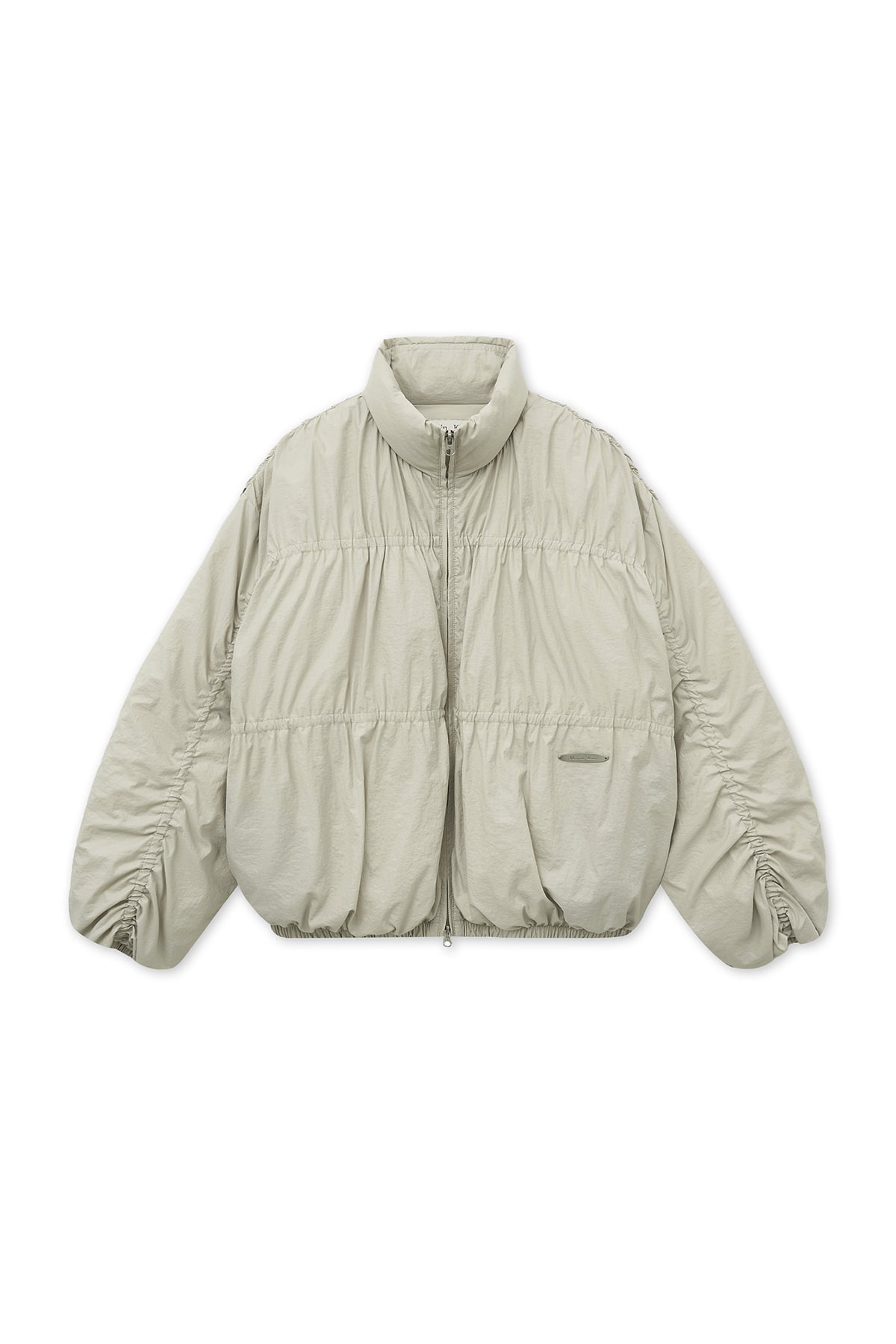 matinkim HIGH NECK SHIRRING DOWN JUMPER IN LIGHT BEIGE