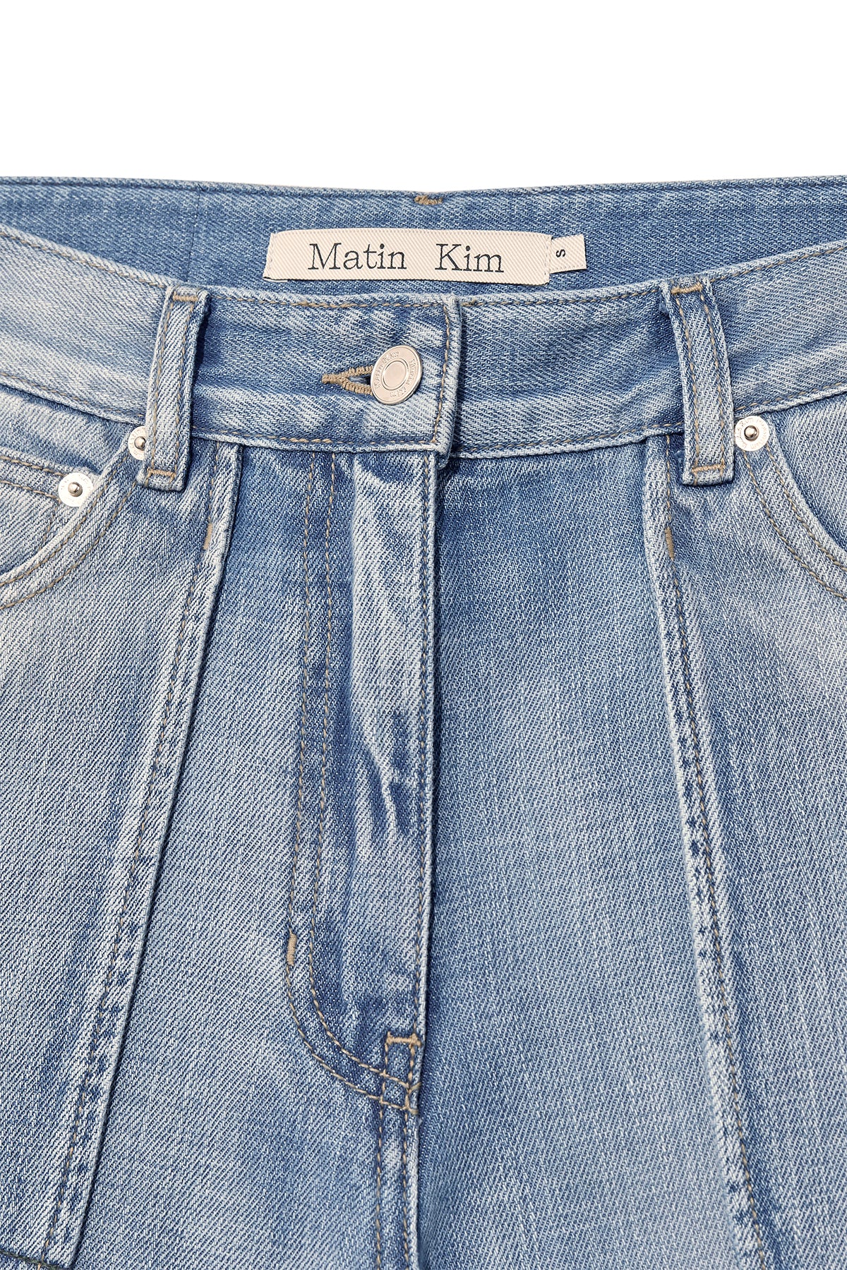 matinkim OUT POCKET WASHED DENIM PANTS IN LIGHT BLUE