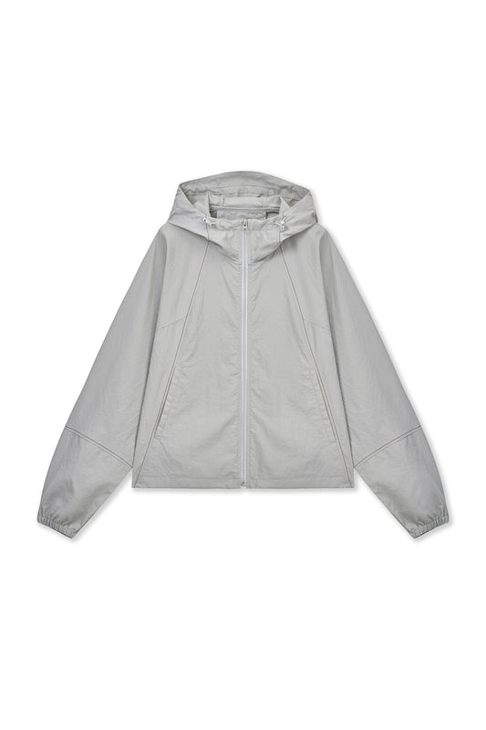 matinkim CROPPED BACK LOGO HOODY WIND BREAKER IN LIGHT BEIGE