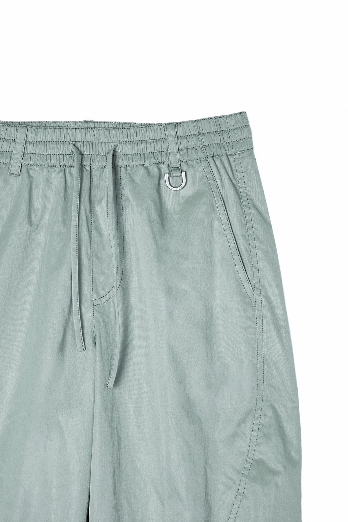 matinkim GLOSSY BANDING TRACK PANTS IN MINT