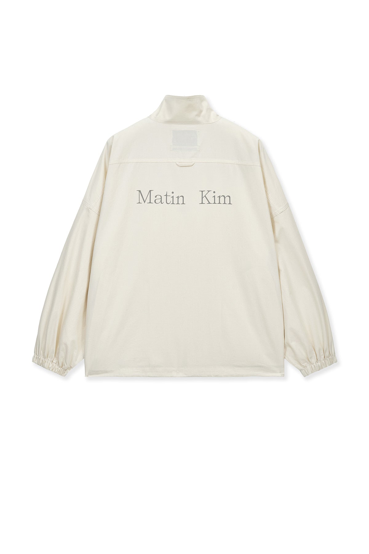 matinkim BACK LOGO HIGH NECK JUMPER IN CREAM