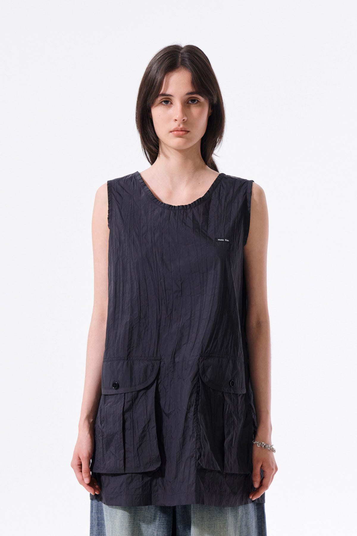 matinkim RAW EDGE PATCH POCKET SLEEVELESS DRESS IN BLACK