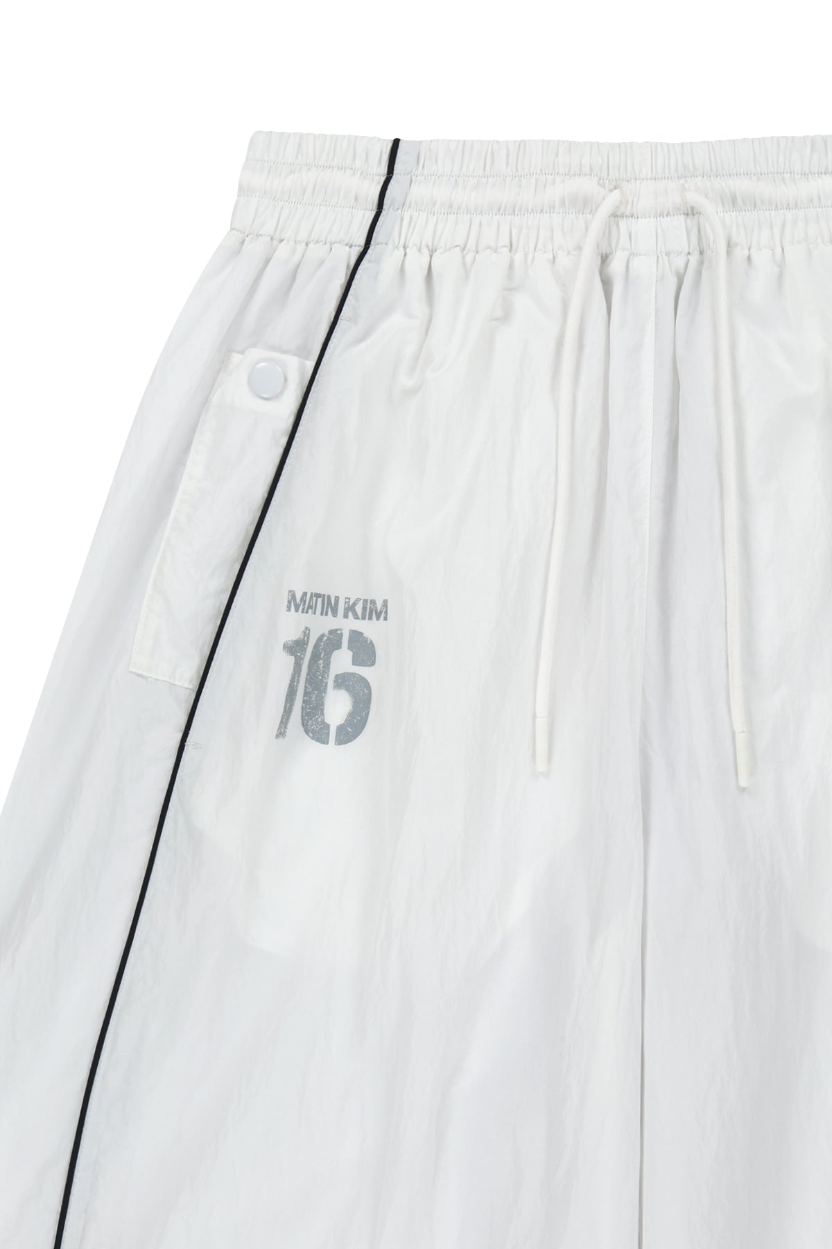 matinkim MATIN 16 LOGO TRACK PANTS IN WHITE