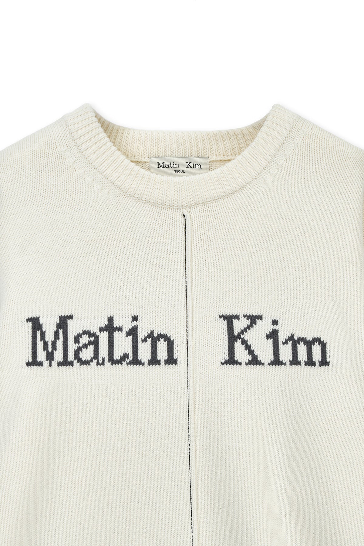 matinkim ASYMMETRIC LOGO KNIT PULLOVER IN IVORY